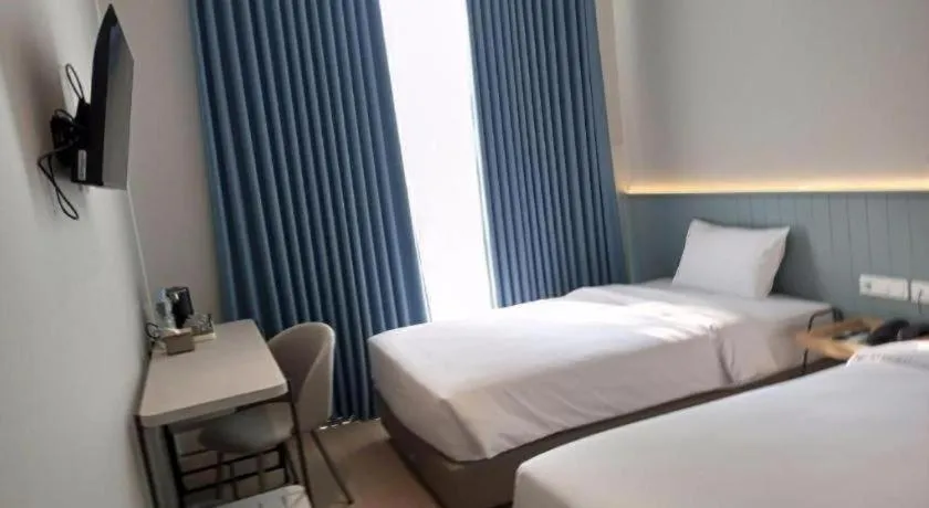 Bed in La Cama Boutique Hotel