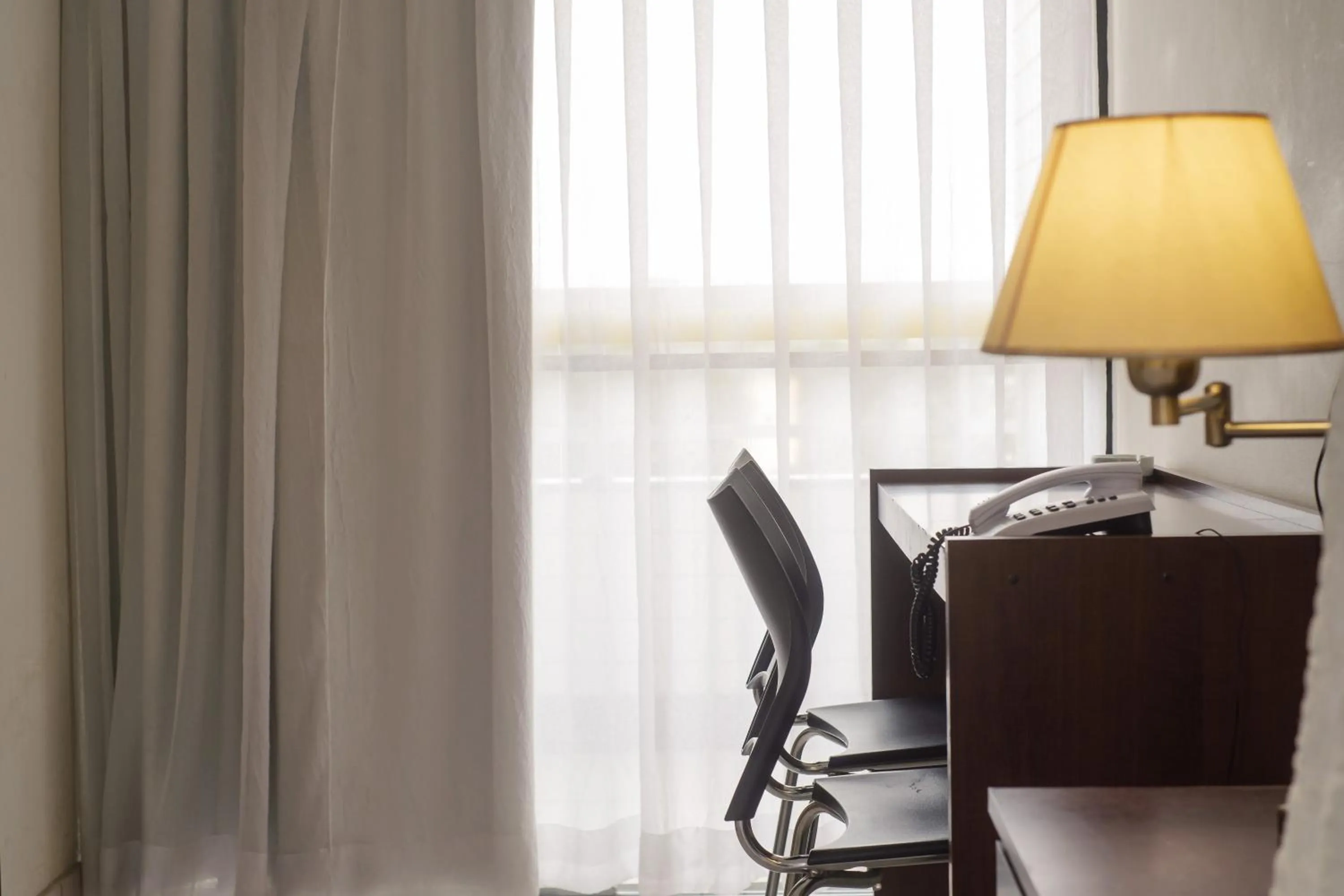 Bedroom in Ibituruna Center Hotel