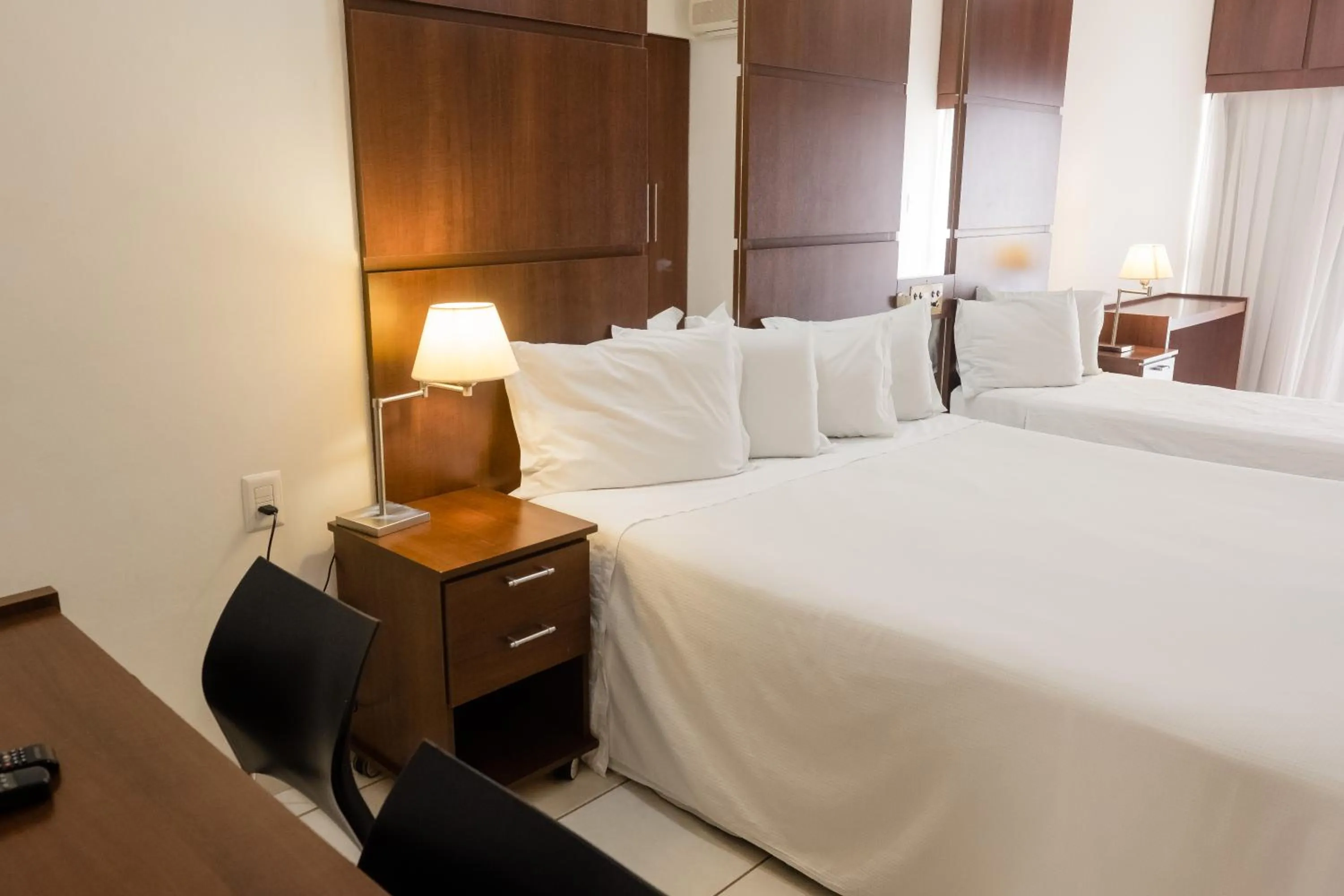 Bed in Ibituruna Center Hotel