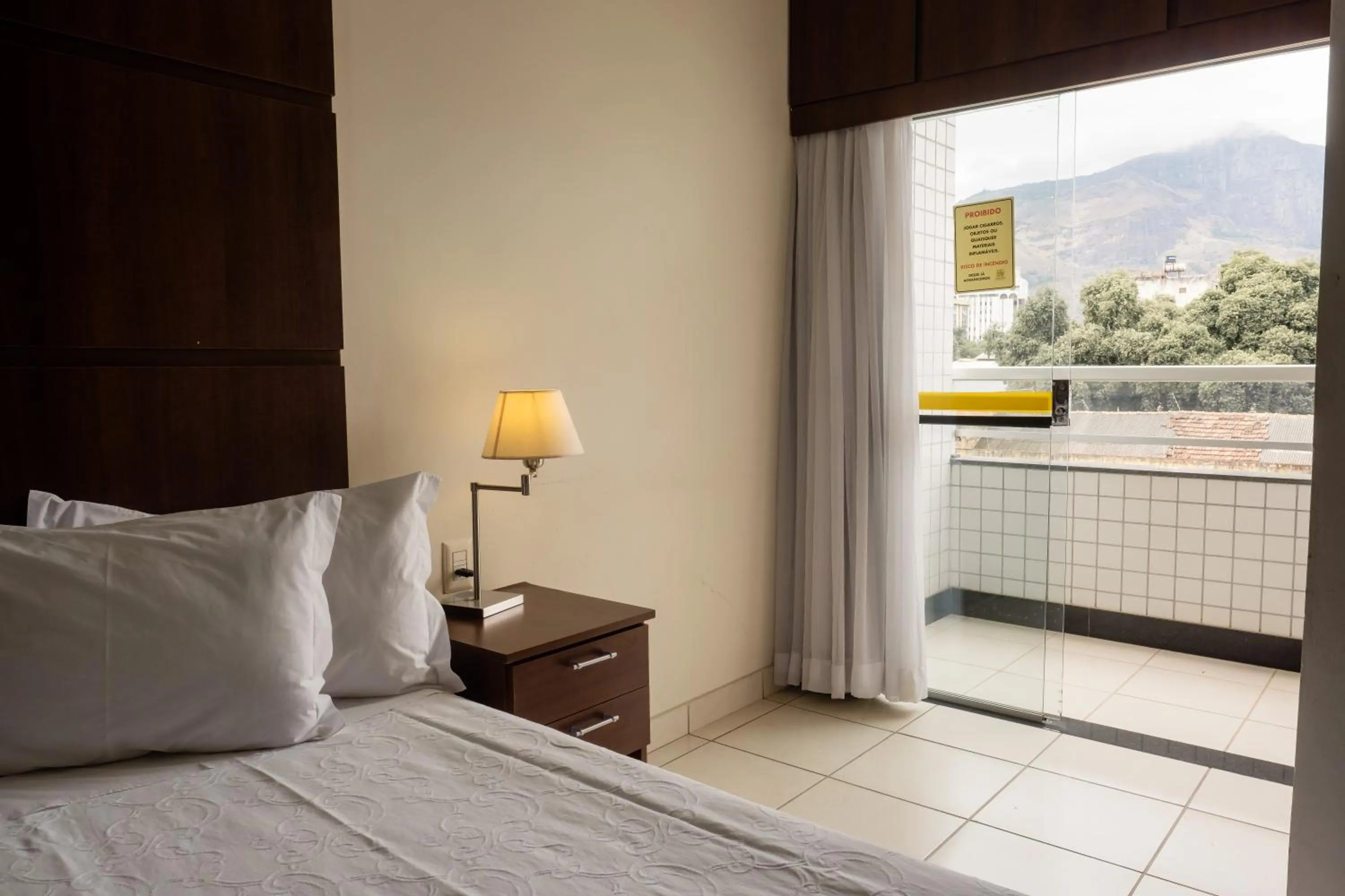 Balcony/Terrace, Bed in Ibituruna Center Hotel