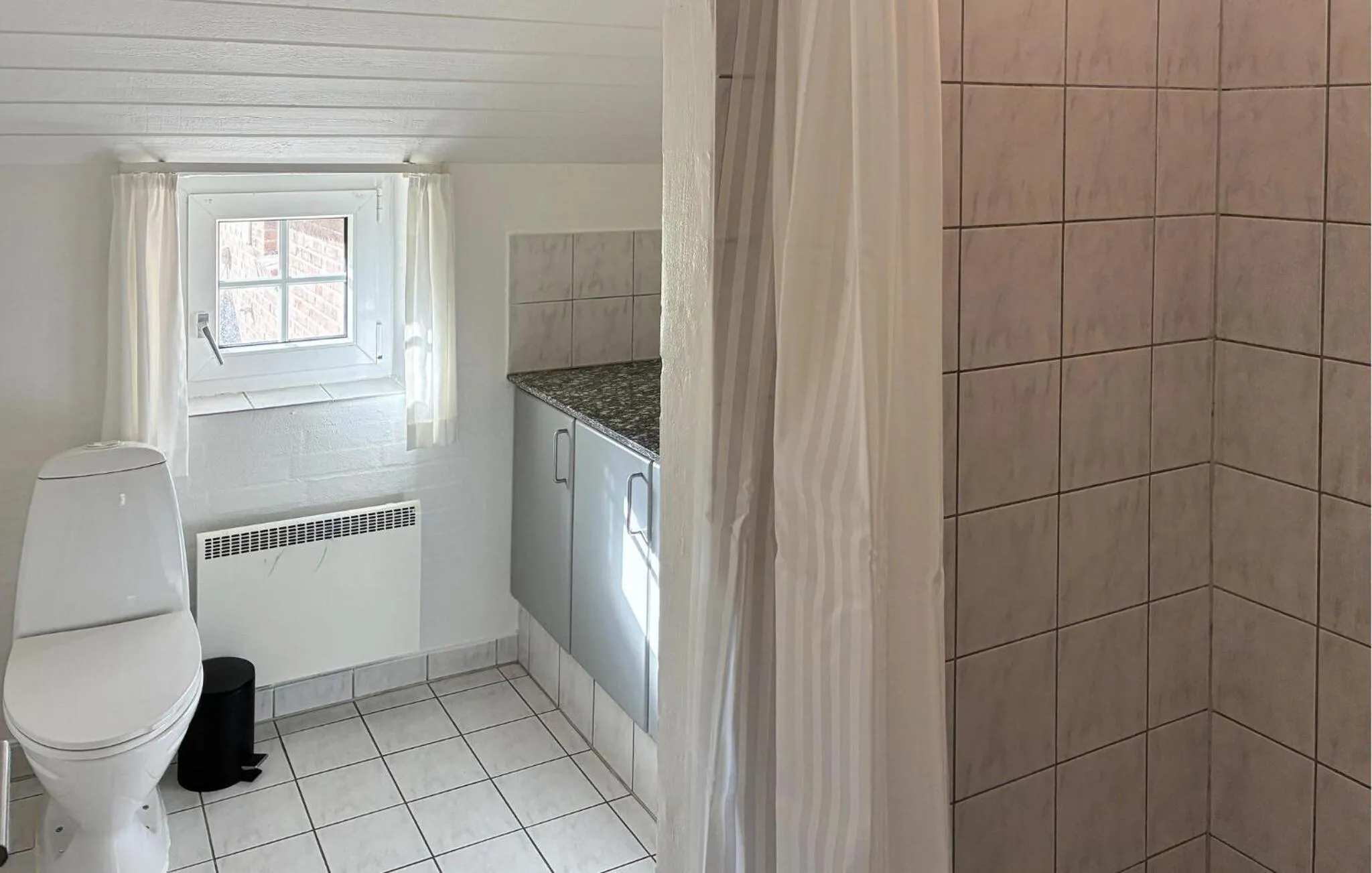 Bathroom in Lovely Home In Væggerløse With Sauna