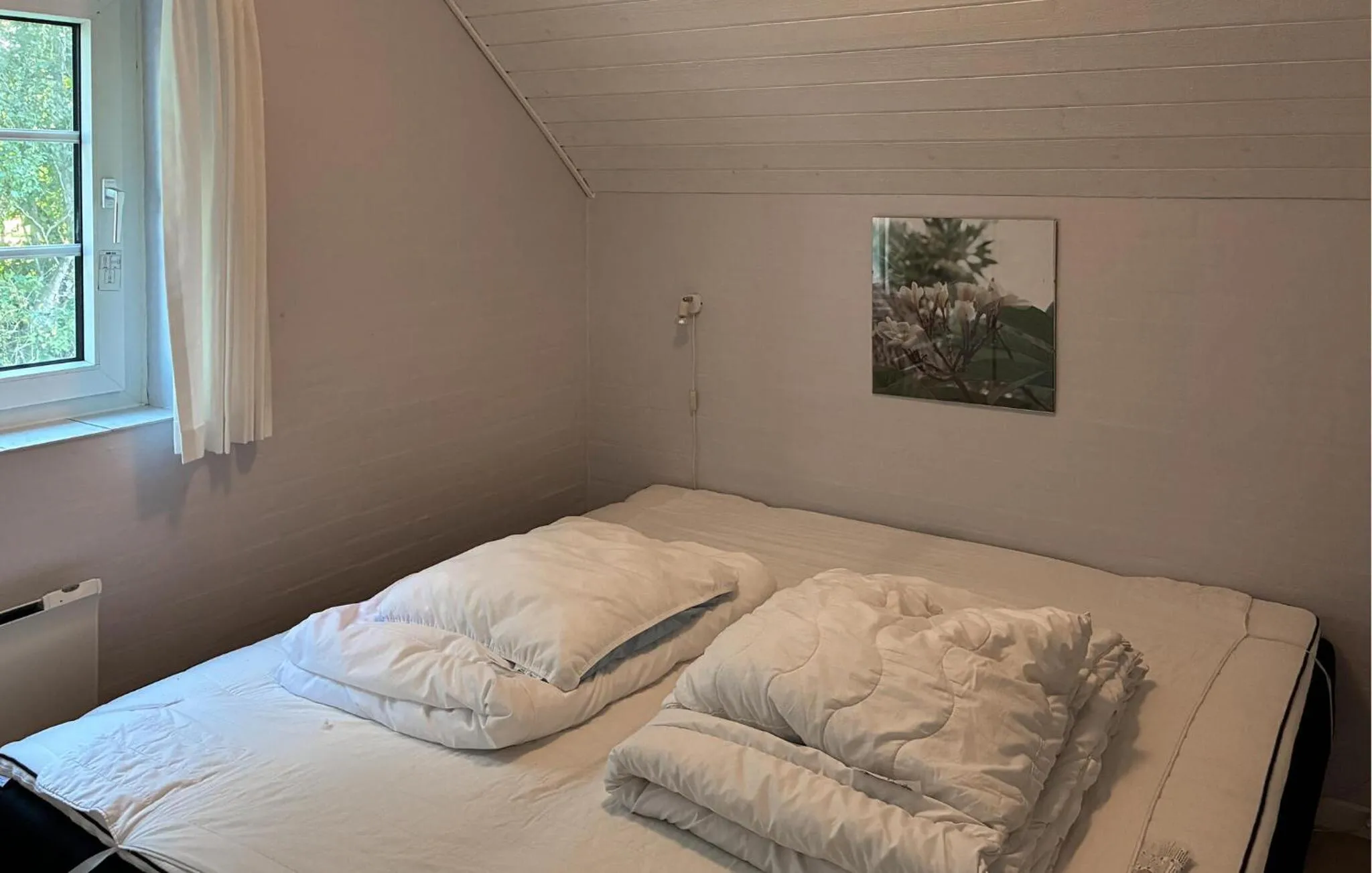 Bed in Lovely Home In Væggerløse With Sauna