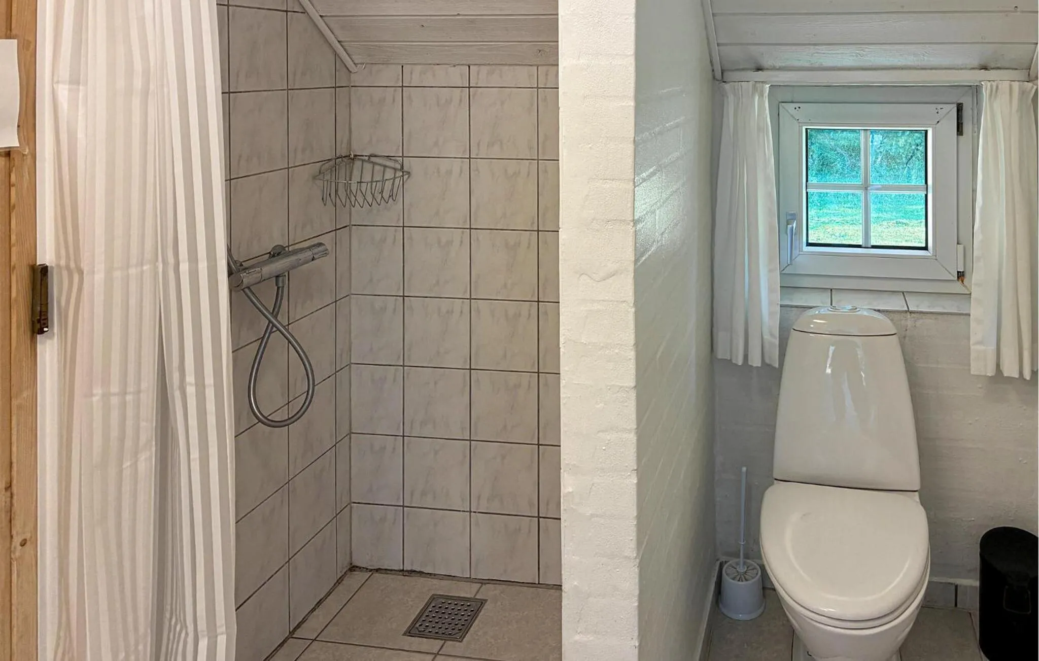 Bathroom in Lovely Home In Væggerløse With Sauna