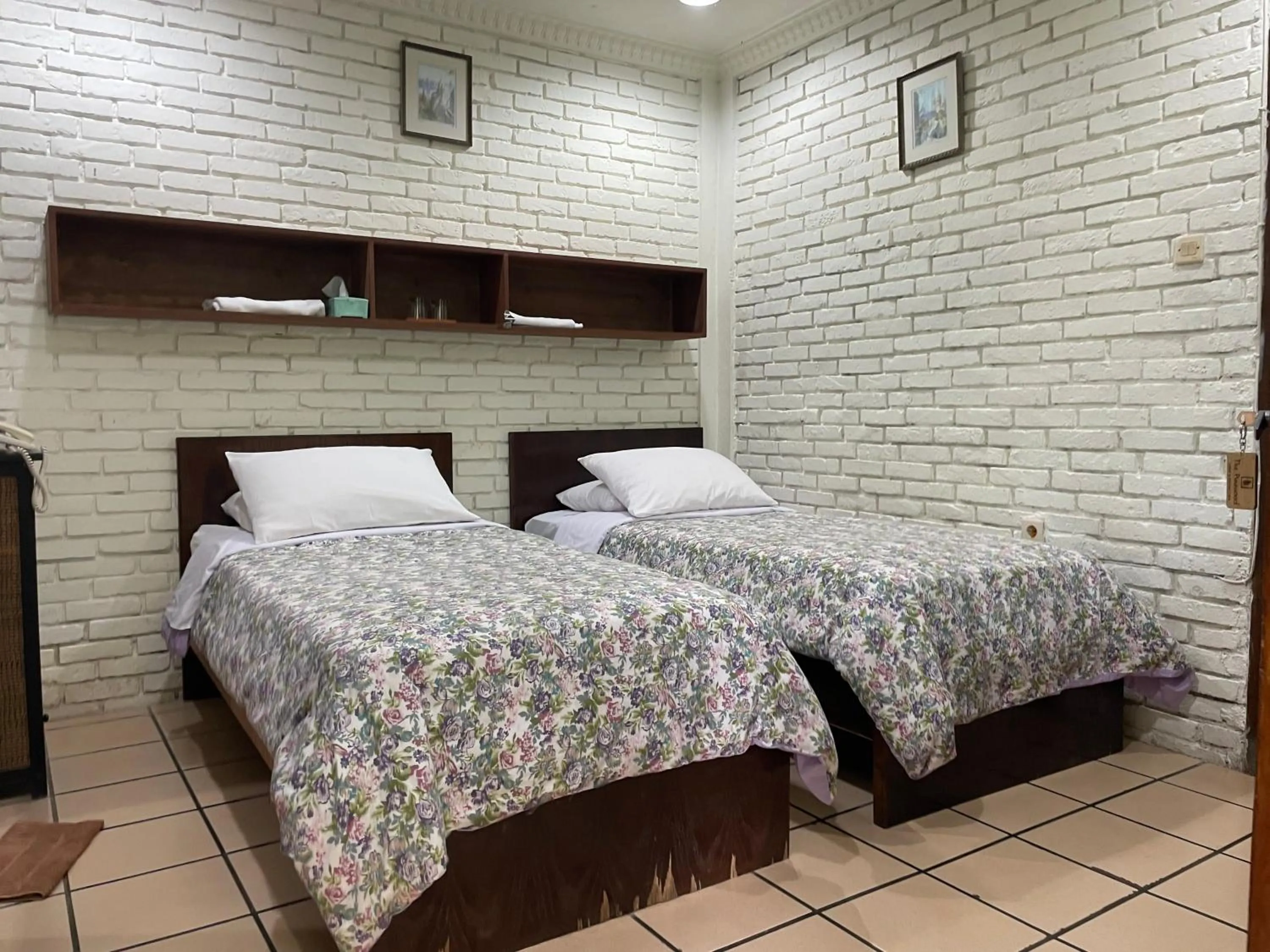 Bed in The Pinewood Lodge and Organic Farm