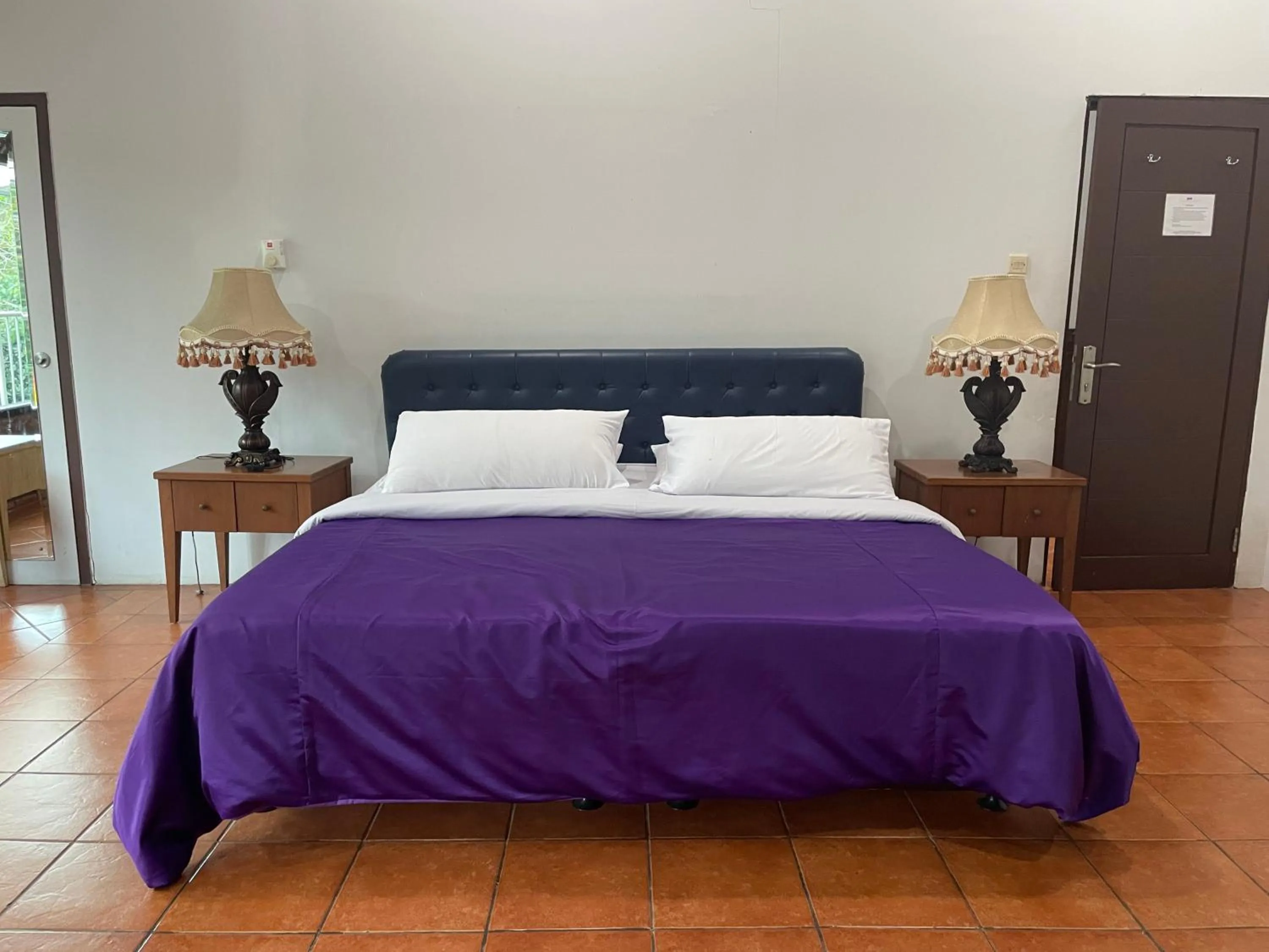 Bed in The Pinewood Lodge and Organic Farm