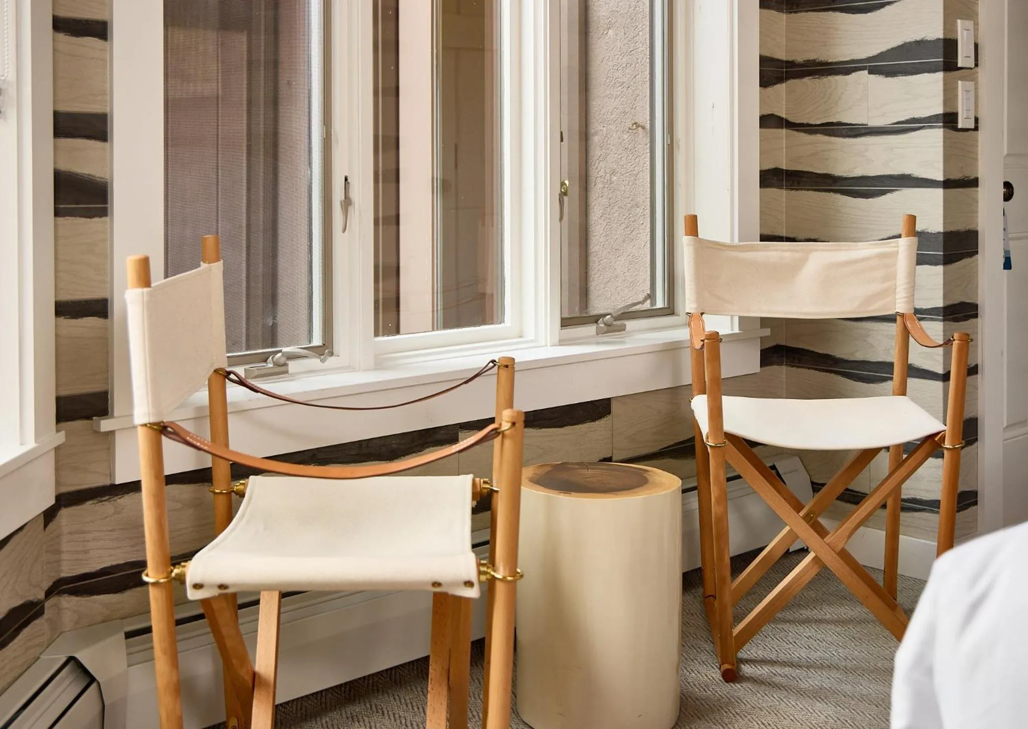 Seating area, Bed in Field Guide Lodge
