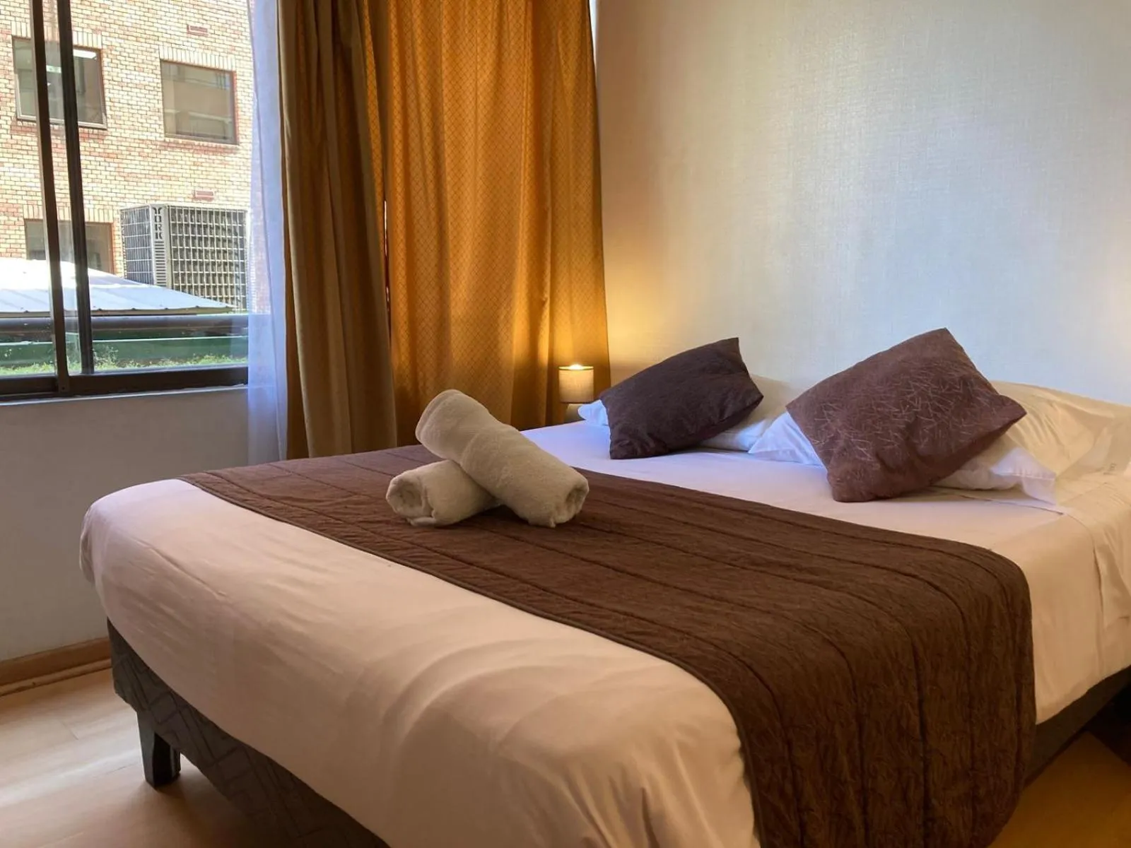 Bed in Apartamentos Costanera Centre