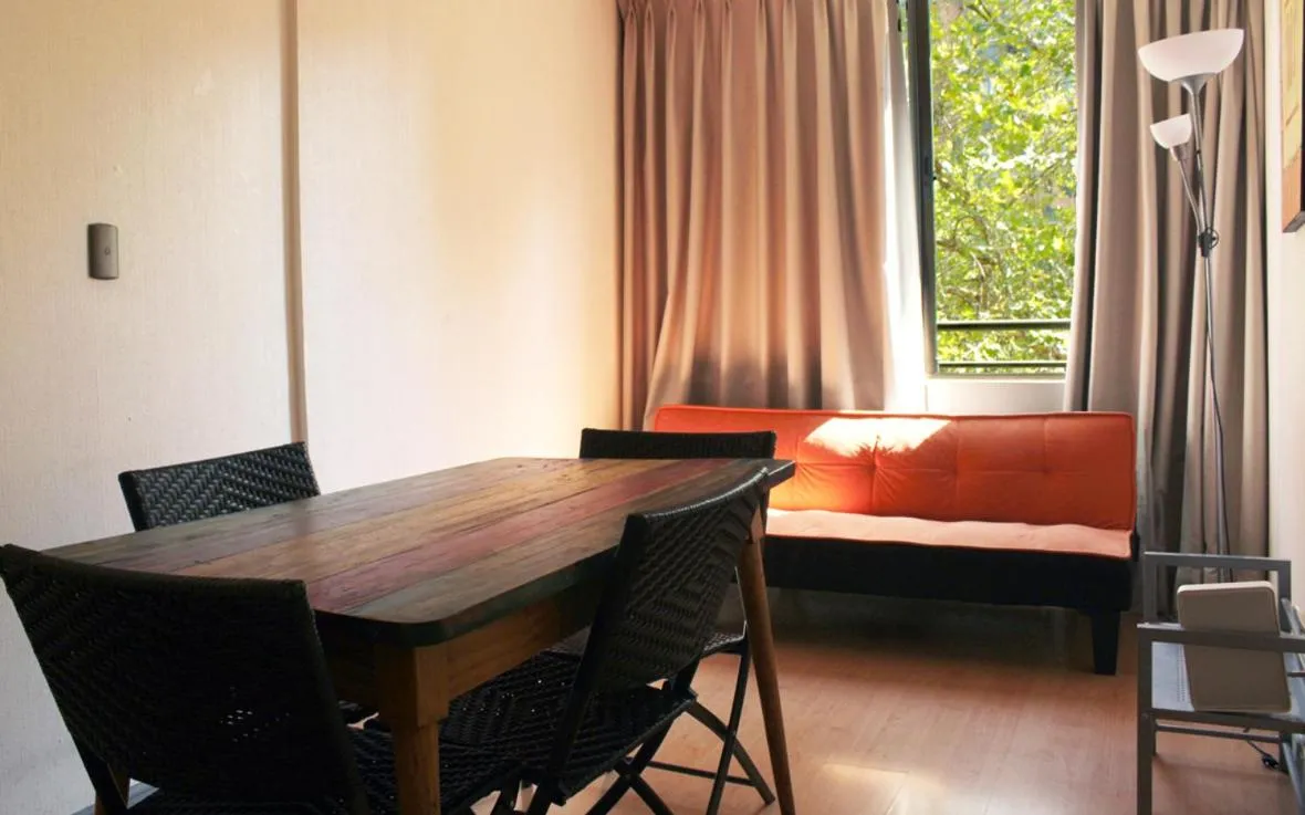 Seating area, Bed in Apartamentos Costanera Centre
