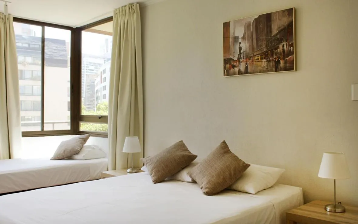 Bedroom, Bed in Apartamentos Costanera Centre