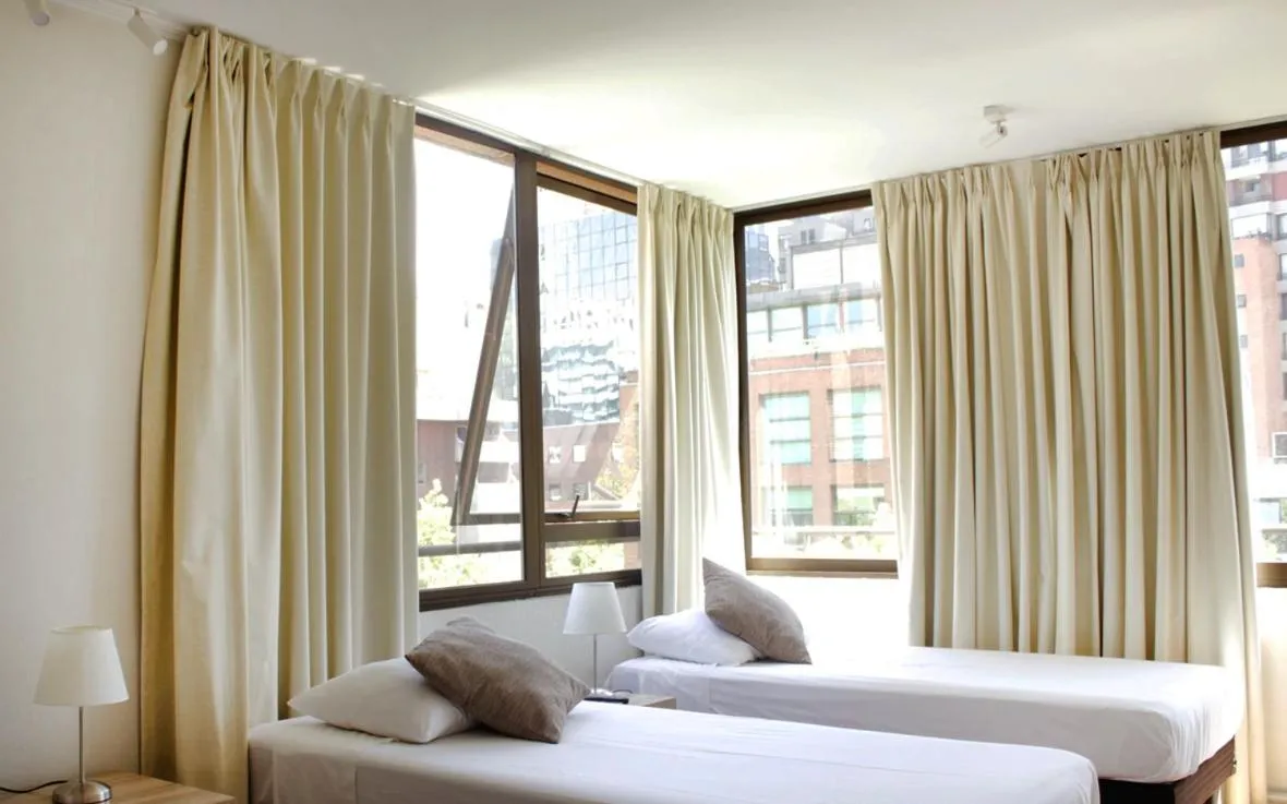 Bedroom, Bed in Apartamentos Costanera Centre