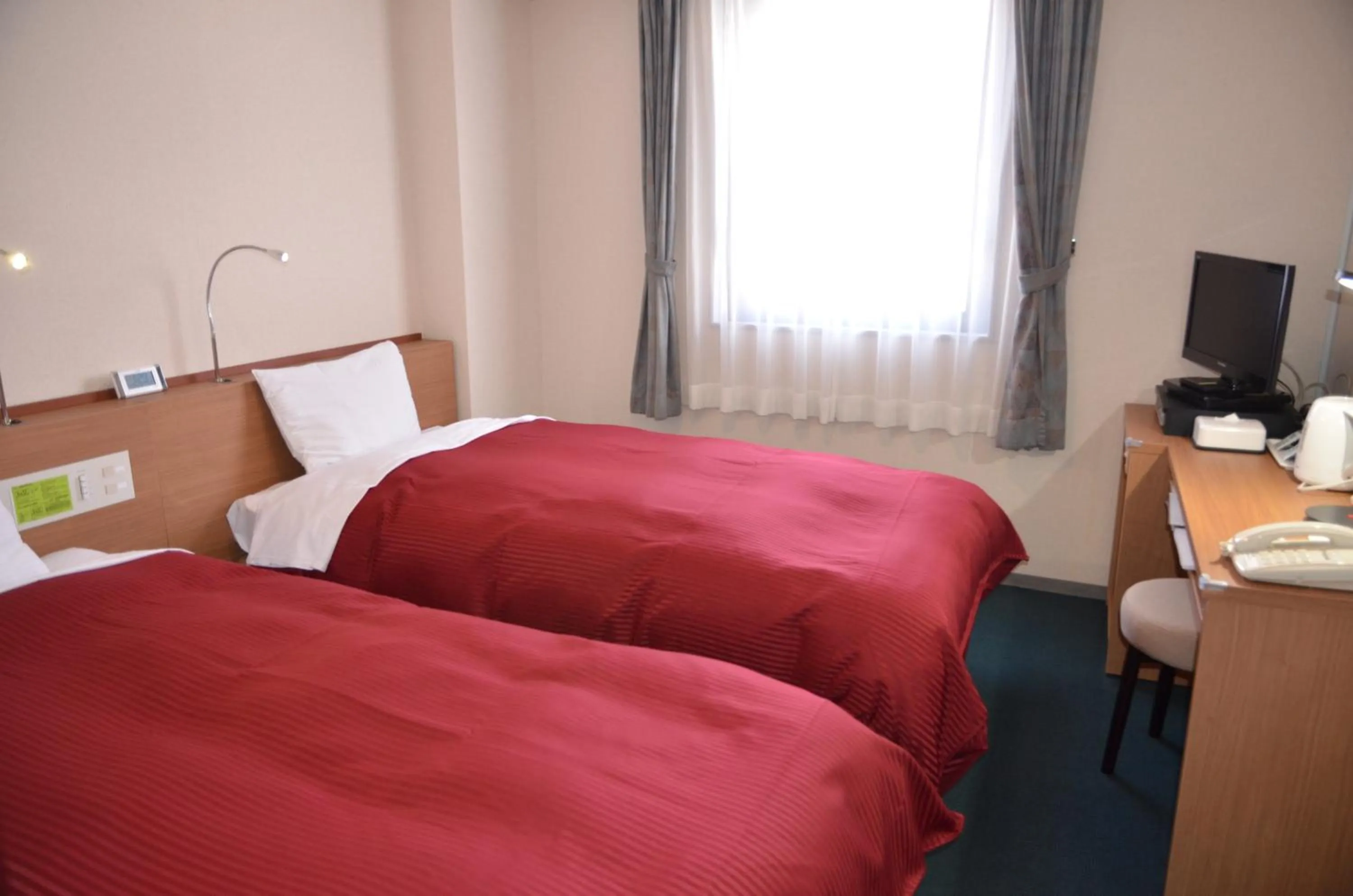 Bed in Hotel Ermou Regency