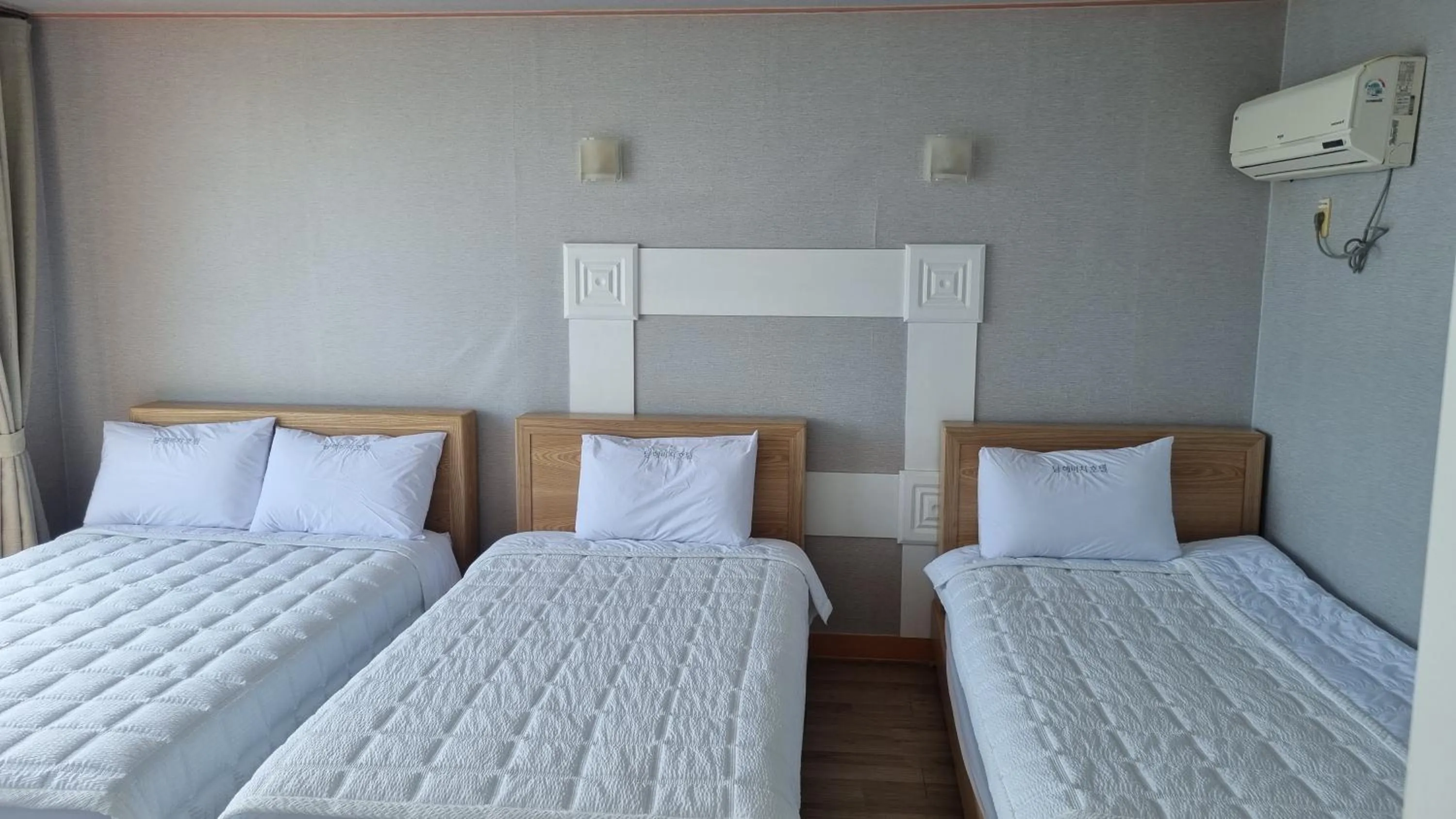 Bed in Namhae Beach Hotel