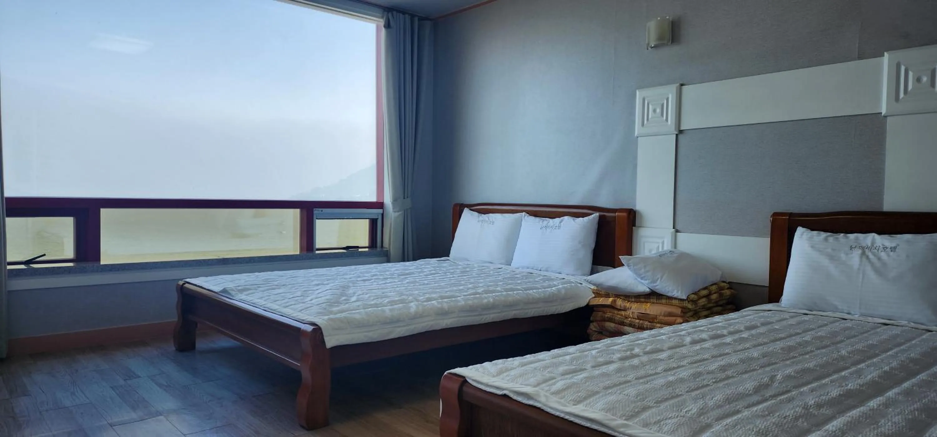 Bed in Namhae Beach Hotel