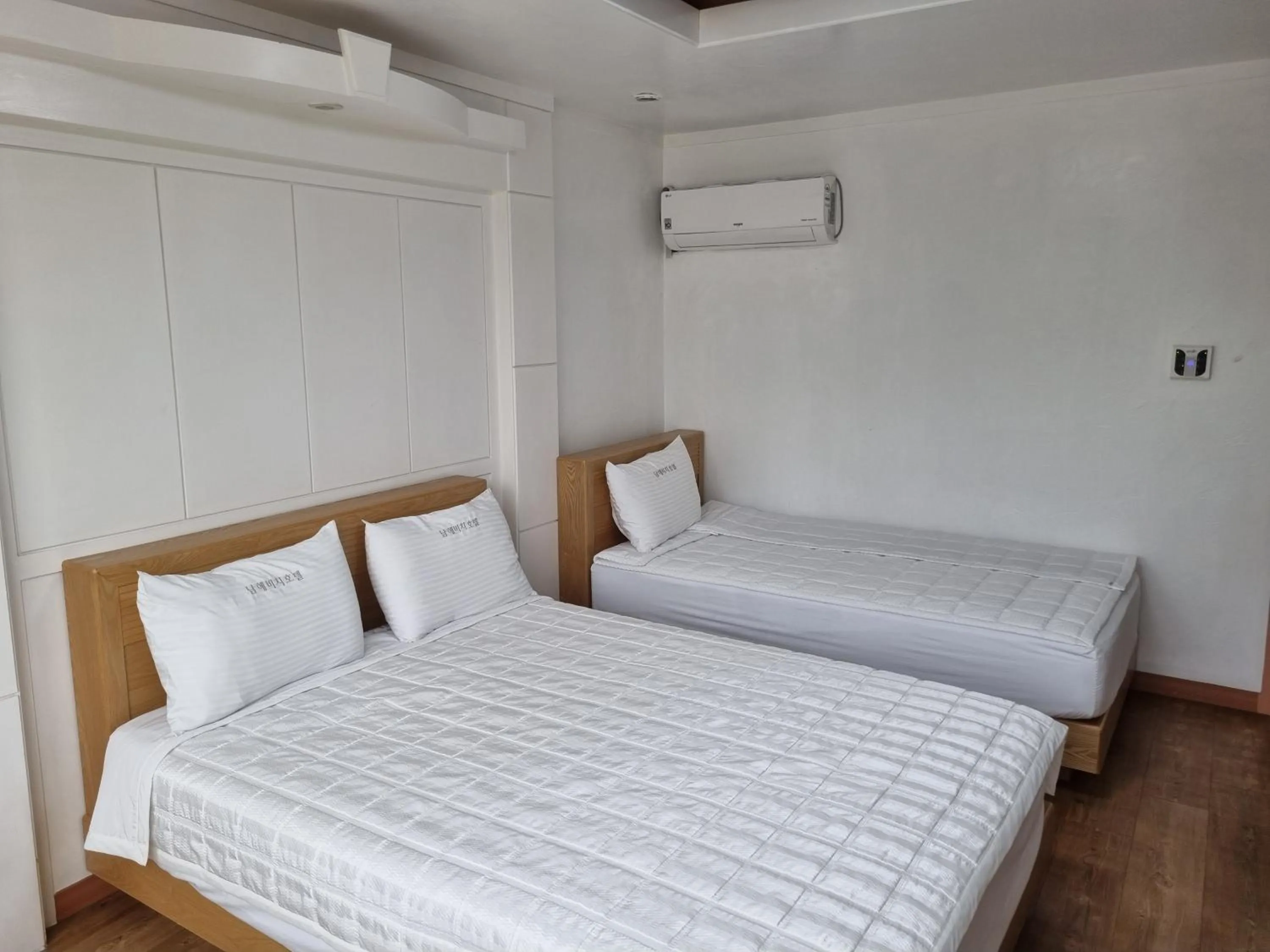 Bed in Namhae Beach Hotel