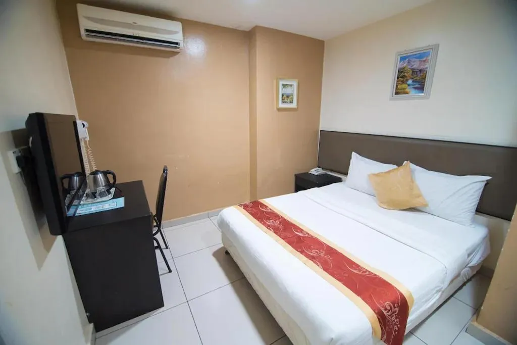 Bed in SohoTown Hotel