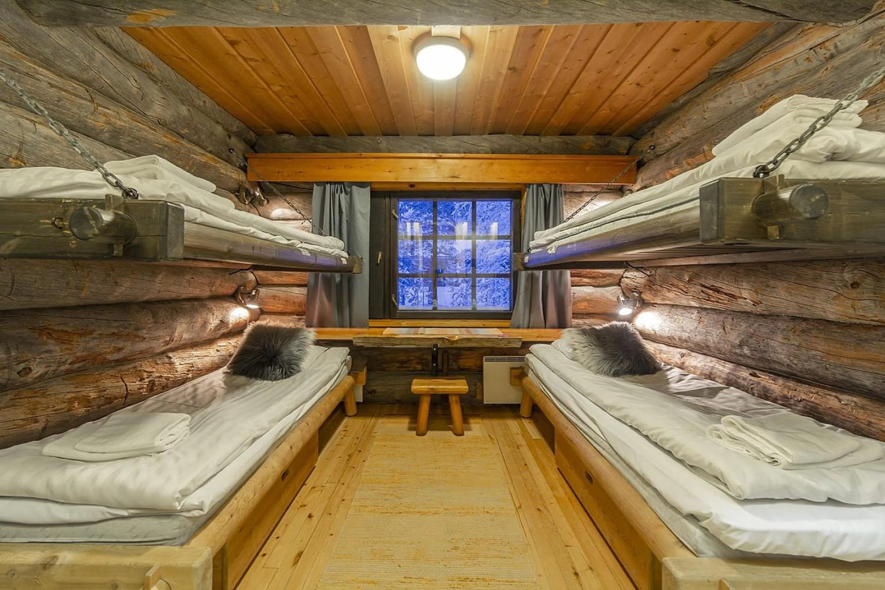 Bed in Kuukkeli Log Houses Porakka Inn