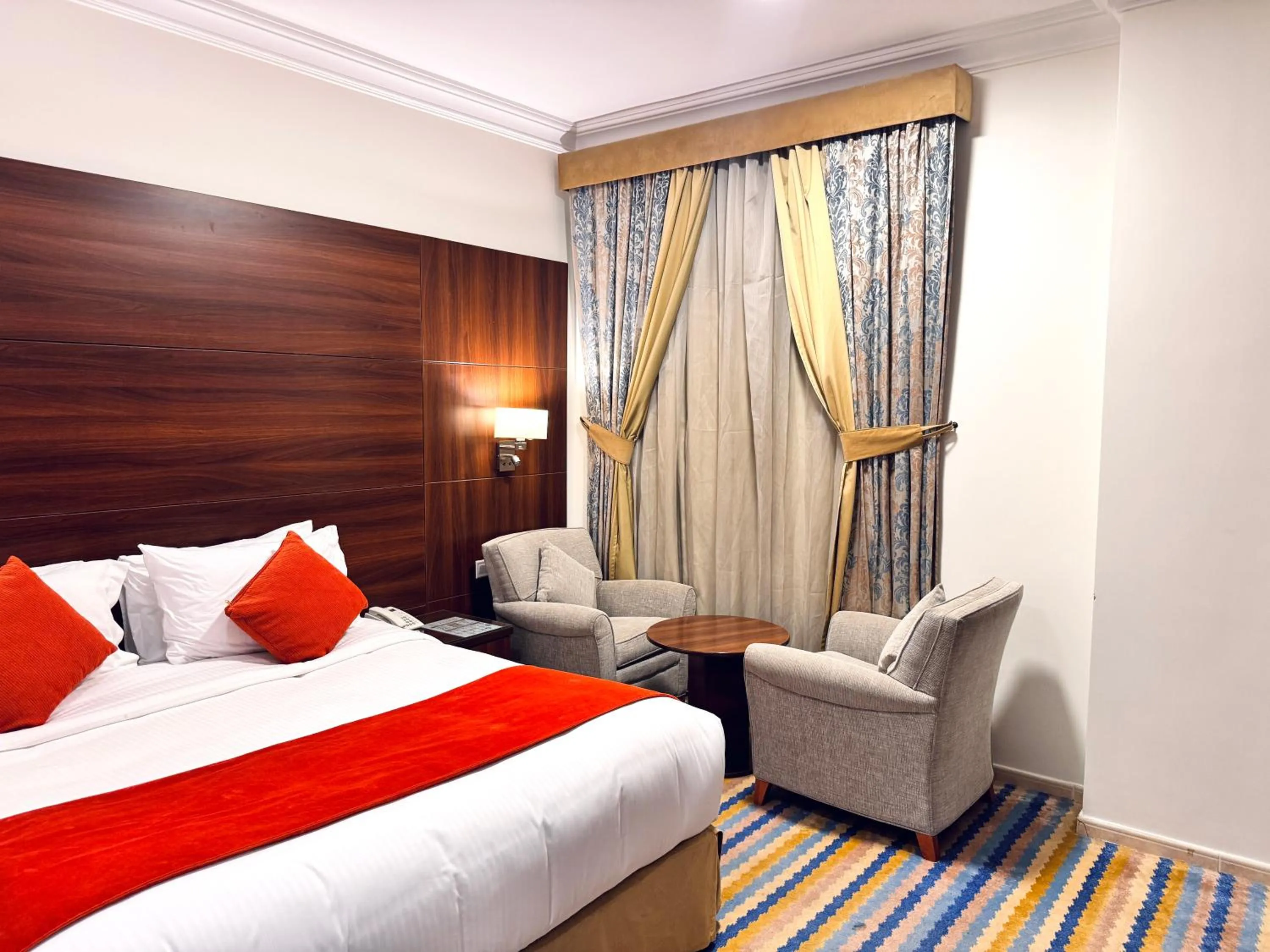 Bed in Rowaa Lindy Hotel Makkah