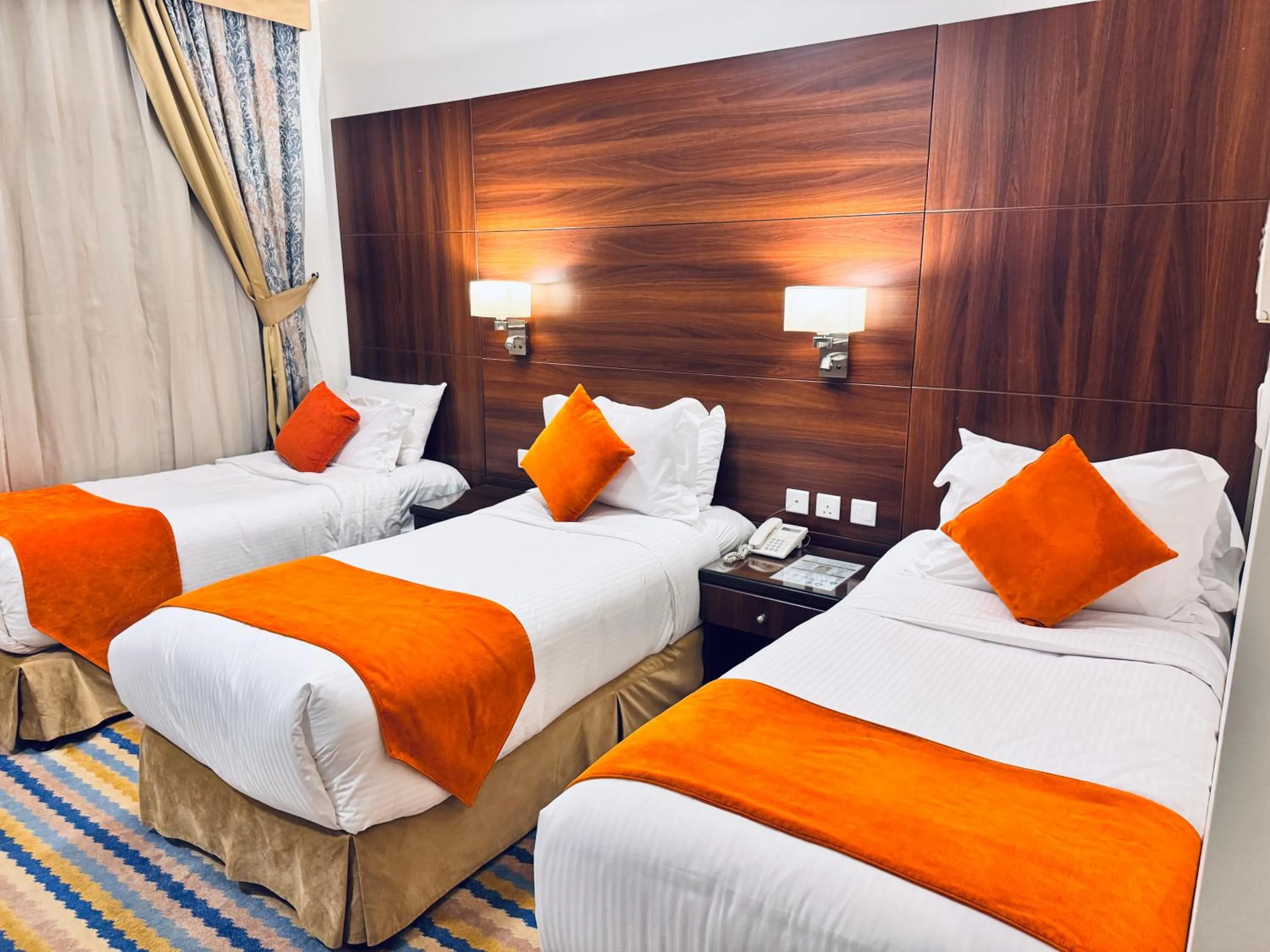 Bed in Rowaa Lindy Hotel Makkah