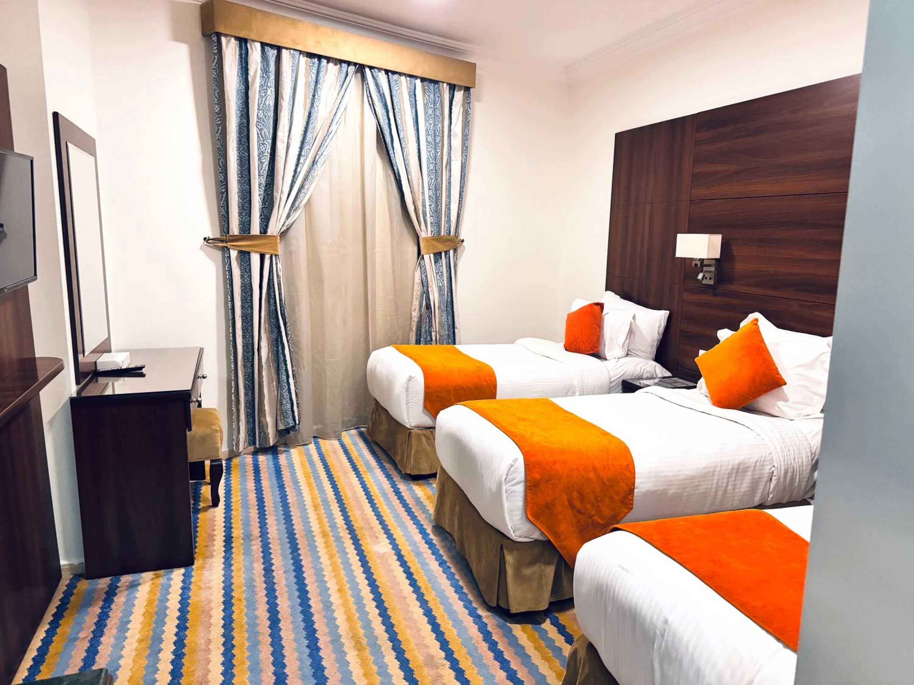 Bed in Rowaa Lindy Hotel Makkah