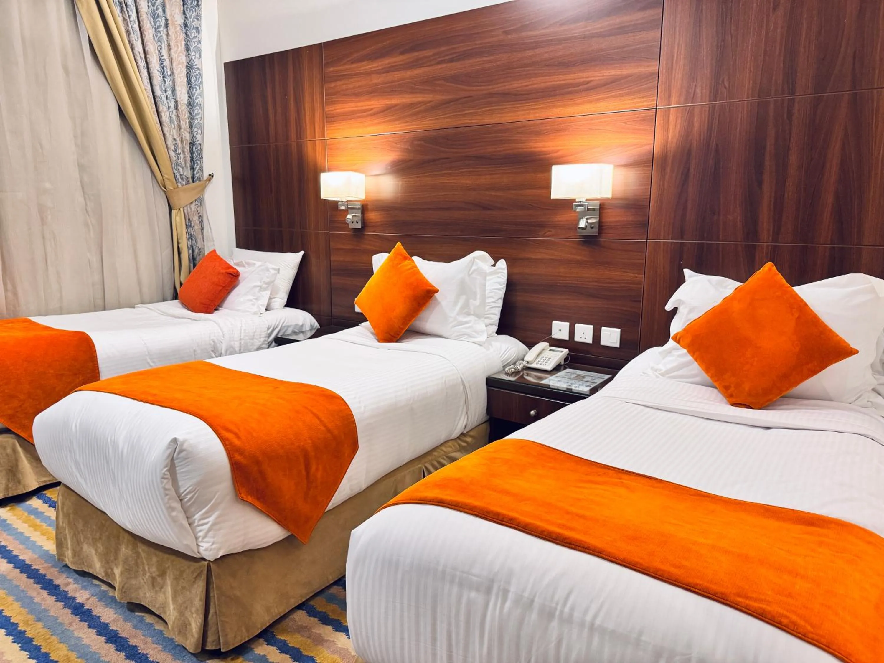 Bed in Rowaa Lindy Hotel Makkah