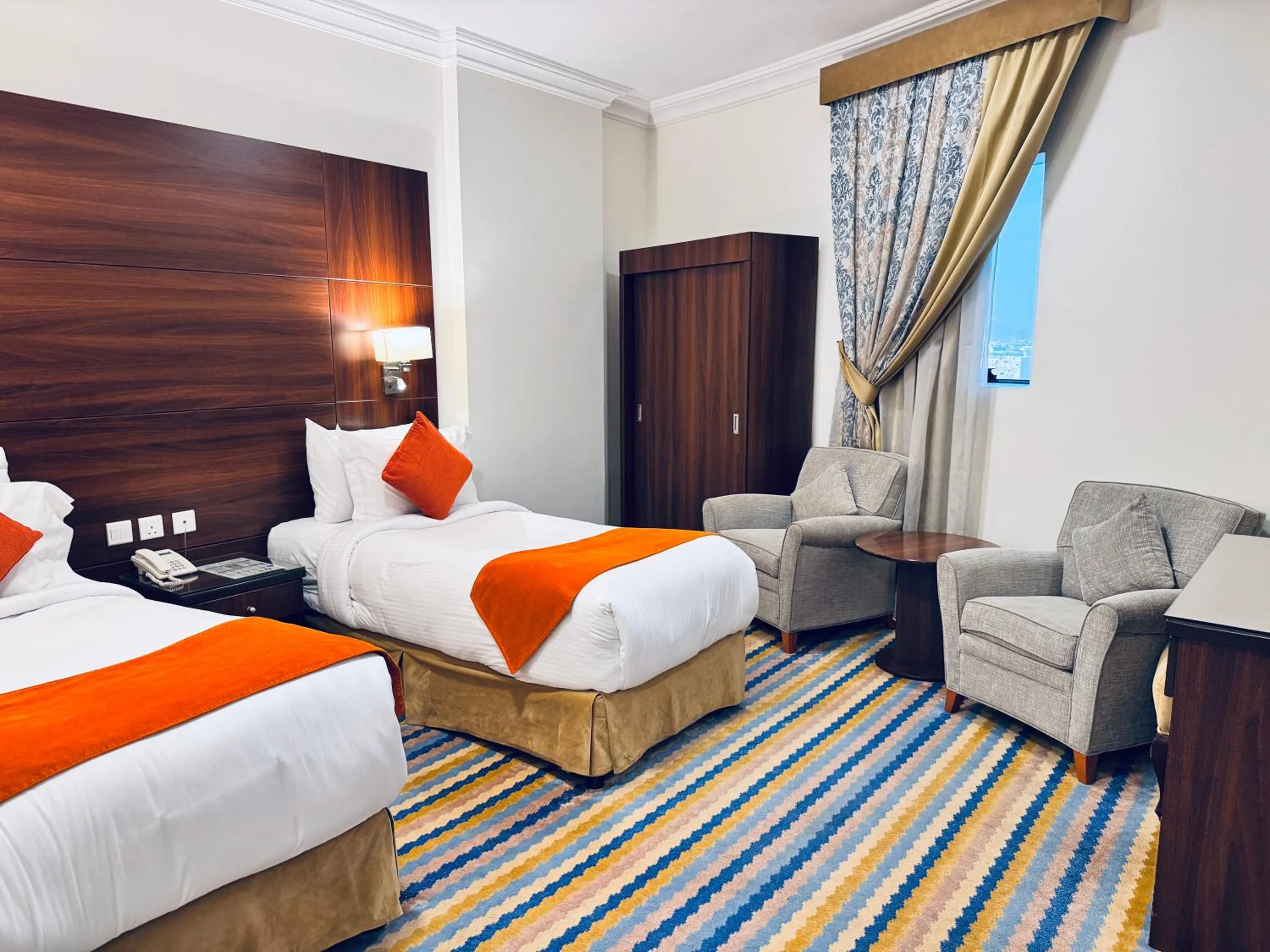 Bed in Rowaa Lindy Hotel Makkah