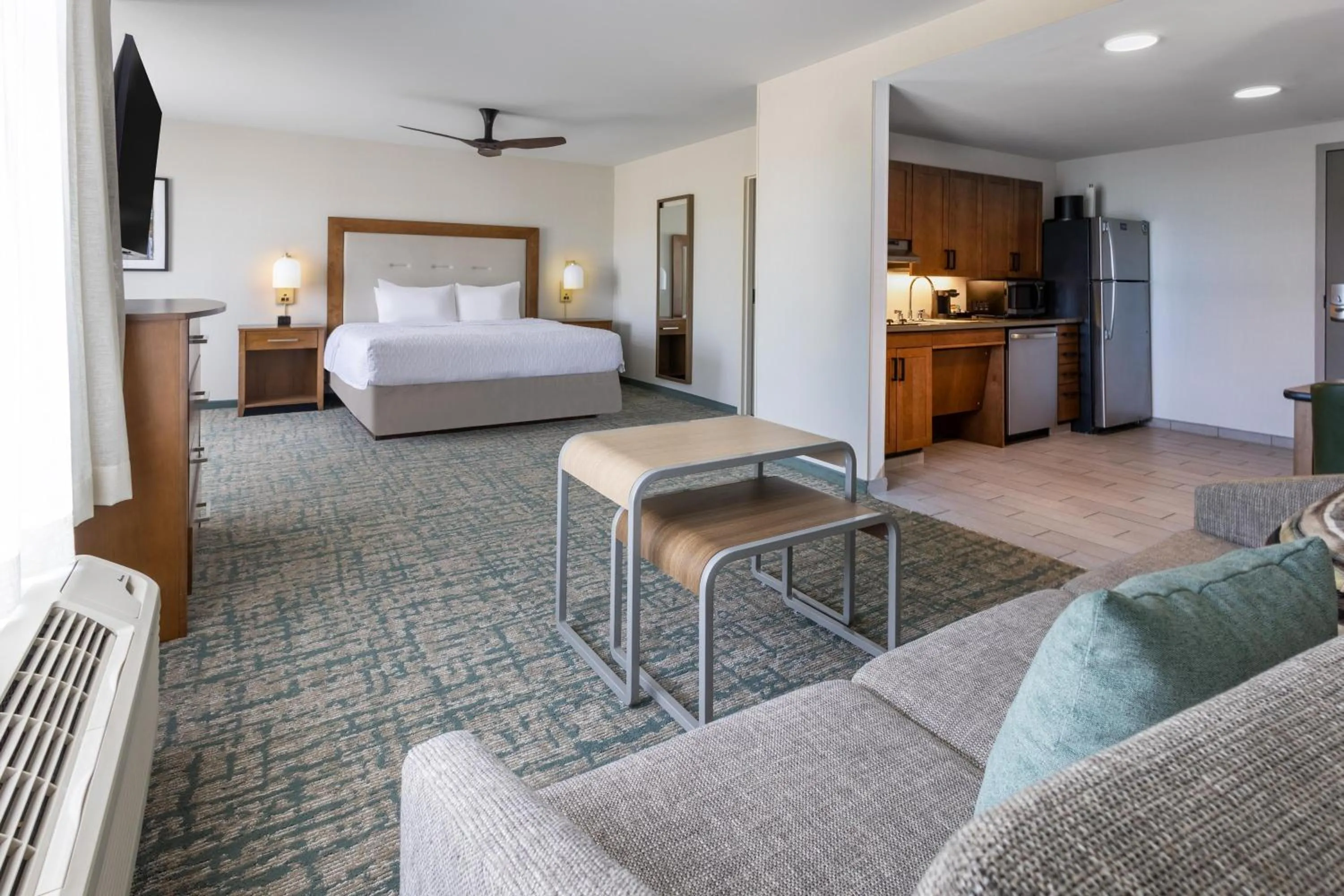 Living room, Bed in Homewood Suites by Hilton Syracuse - Carrier Circle