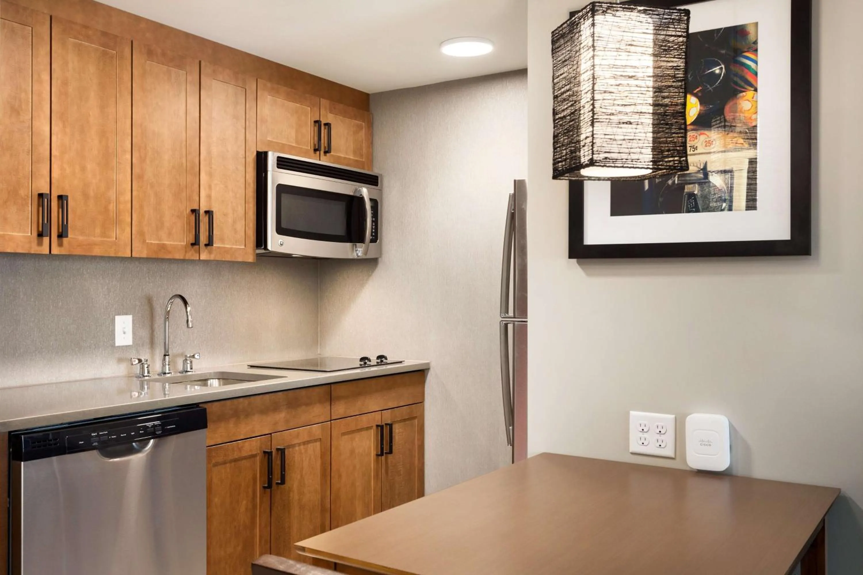 Kitchen or kitchenette in Homewood Suites by Hilton Syracuse - Carrier Circle