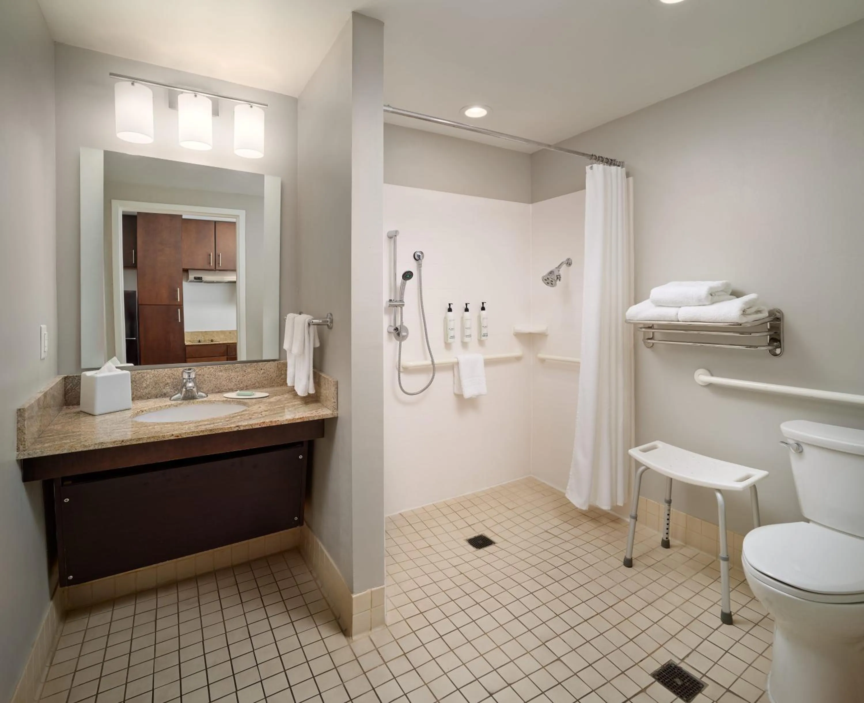 Shower in TownePlace Suites Orlando at FLAMINGO CROSSINGS Town Center, Western Entrance