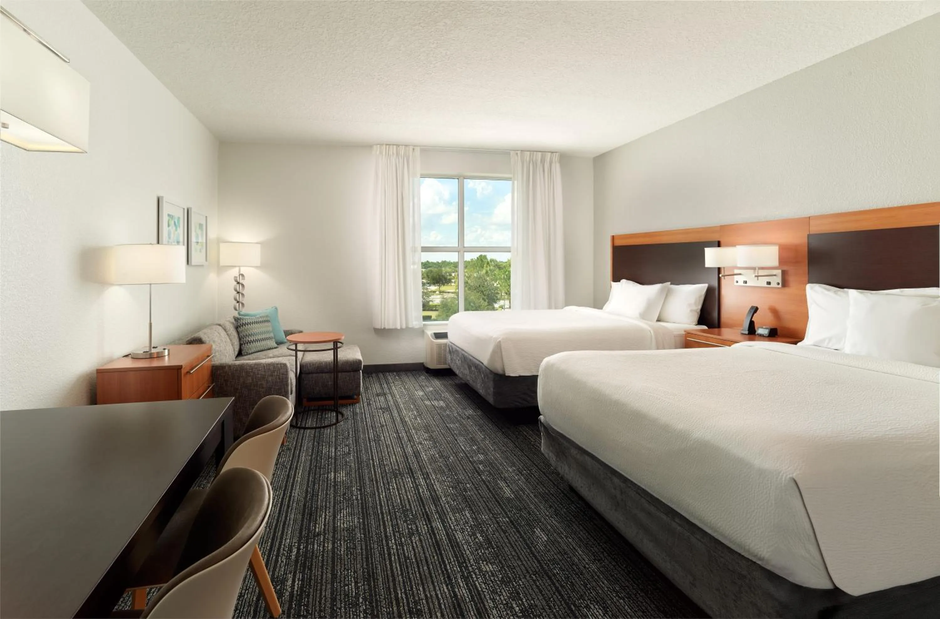 Bed in TownePlace Suites Orlando at FLAMINGO CROSSINGS Town Center, Western Entrance