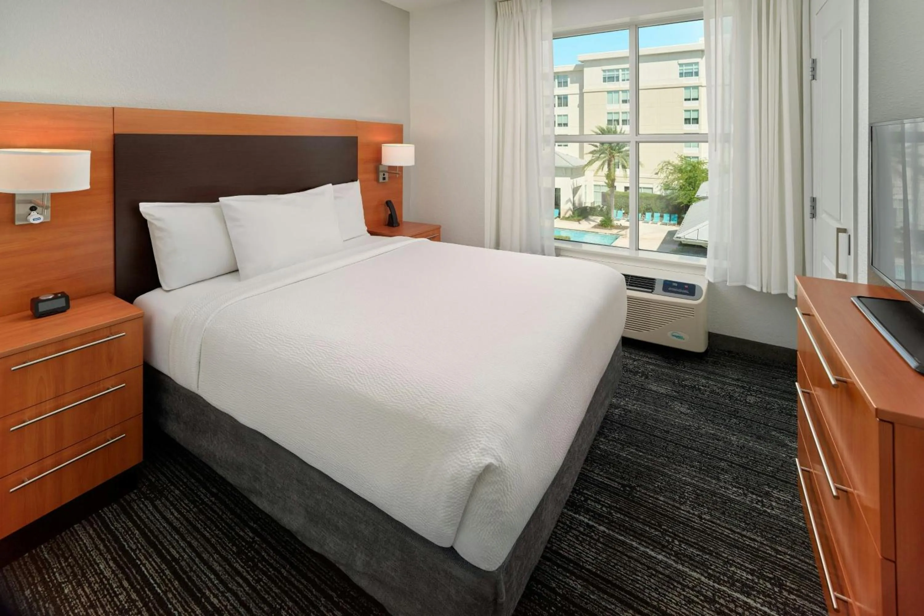 Bedroom, Bed in TownePlace Suites Orlando at FLAMINGO CROSSINGS Town Center, Western Entrance