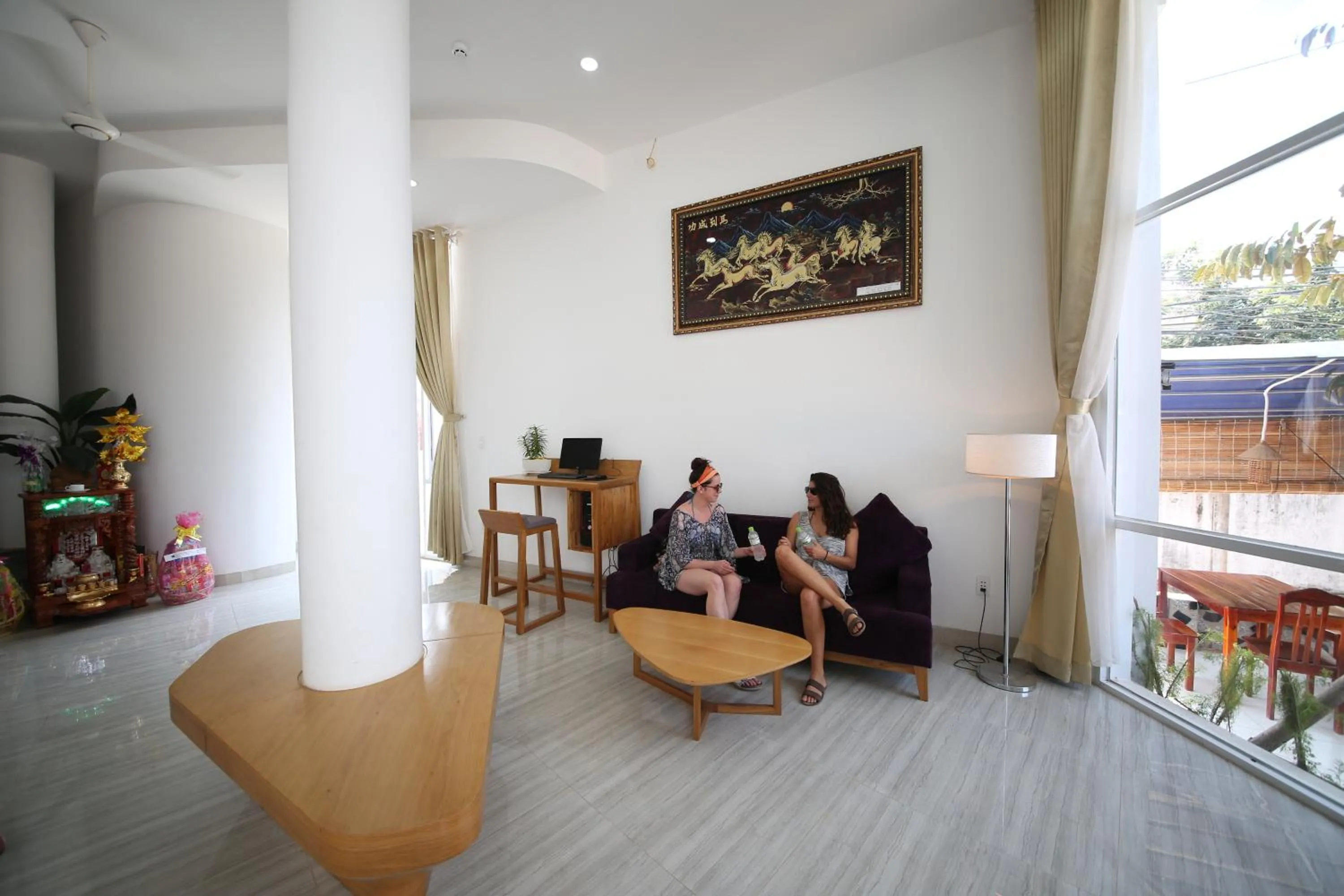 Communal lounge/ TV room in Sailing Hotel Phú Quốc