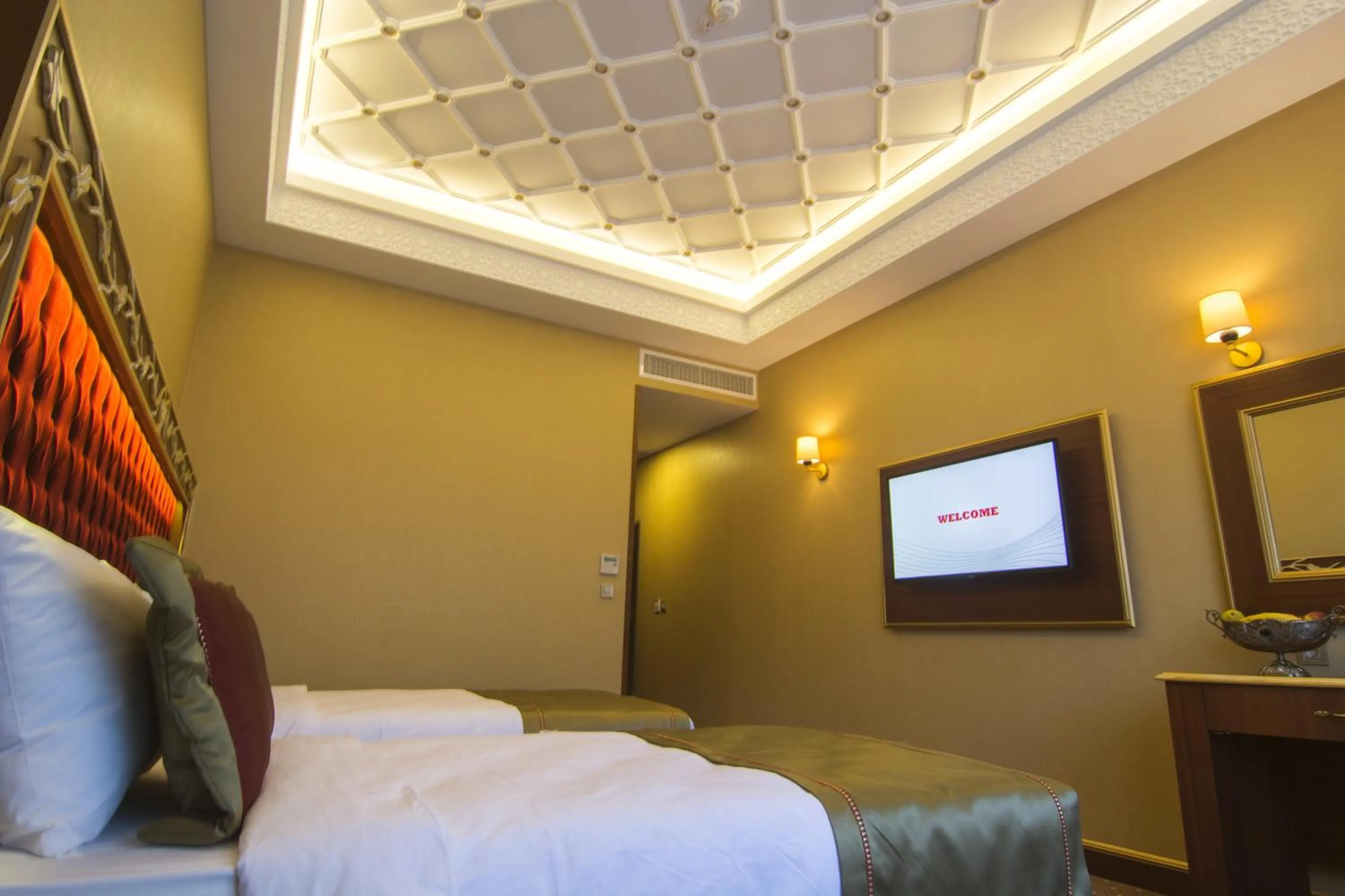 TV and multimedia, TV/Entertainment Center in MB Deluxe Hotel