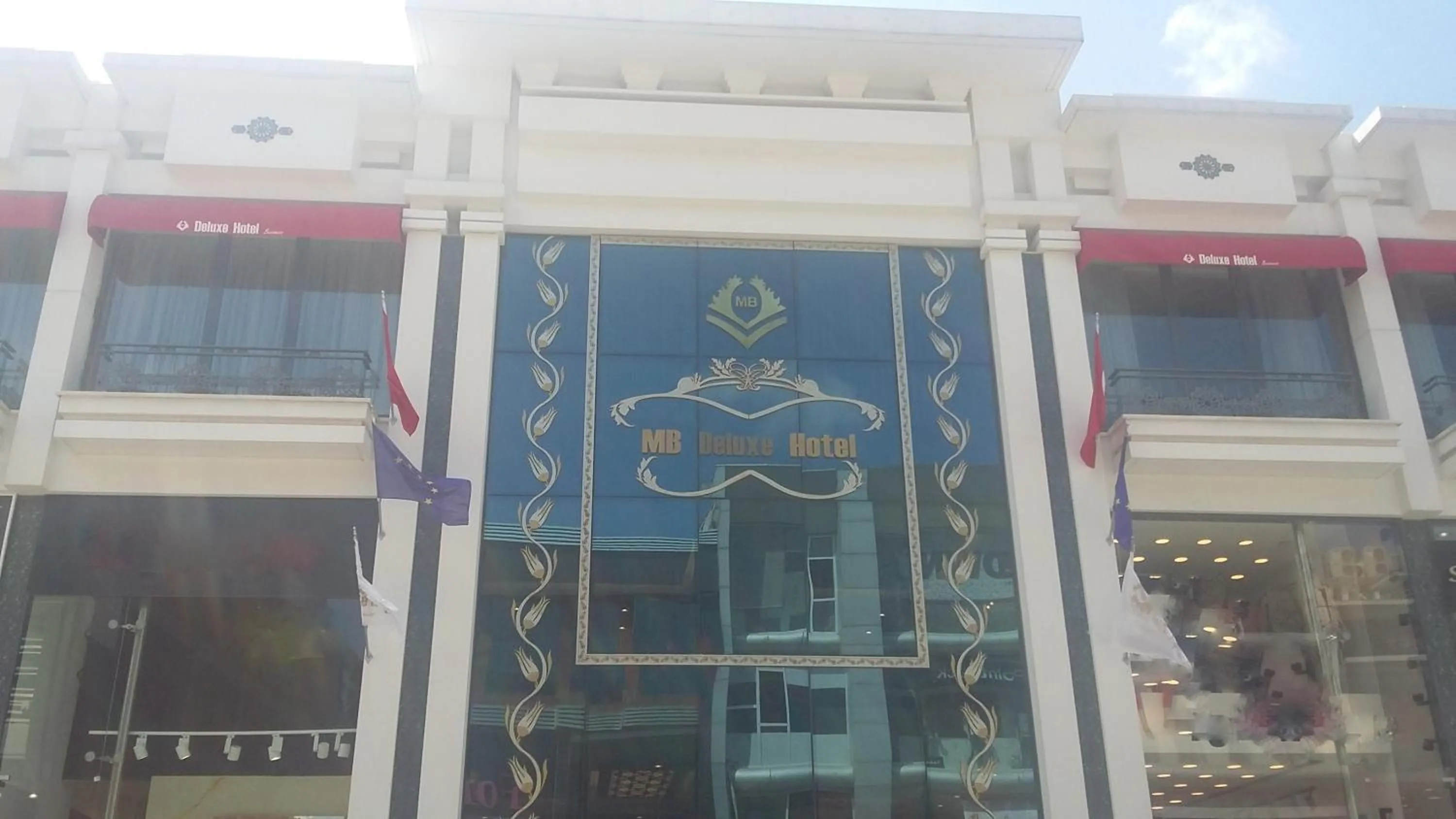 Facade/entrance in MB Deluxe Hotel