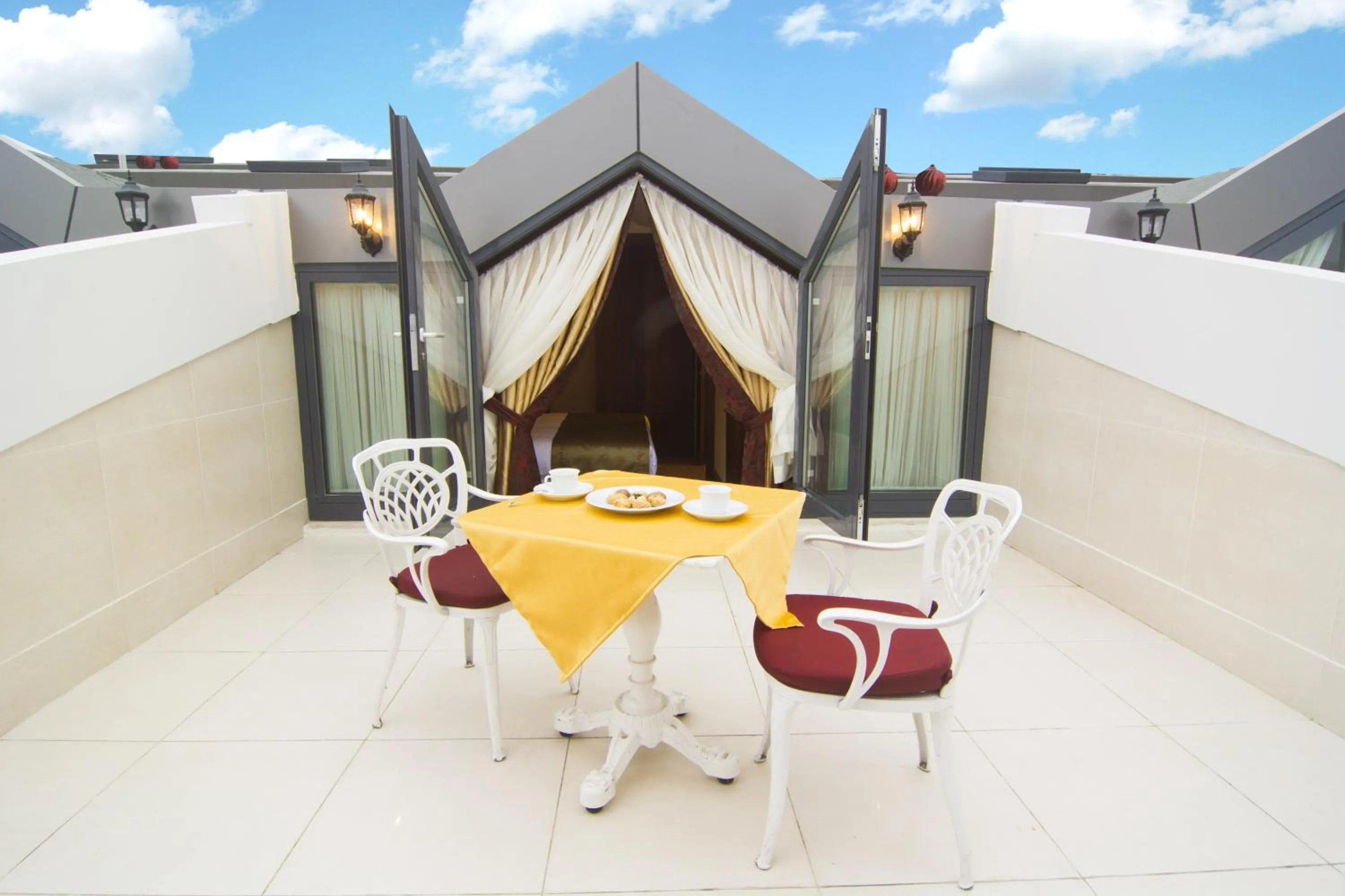 Dining area in MB Deluxe Hotel