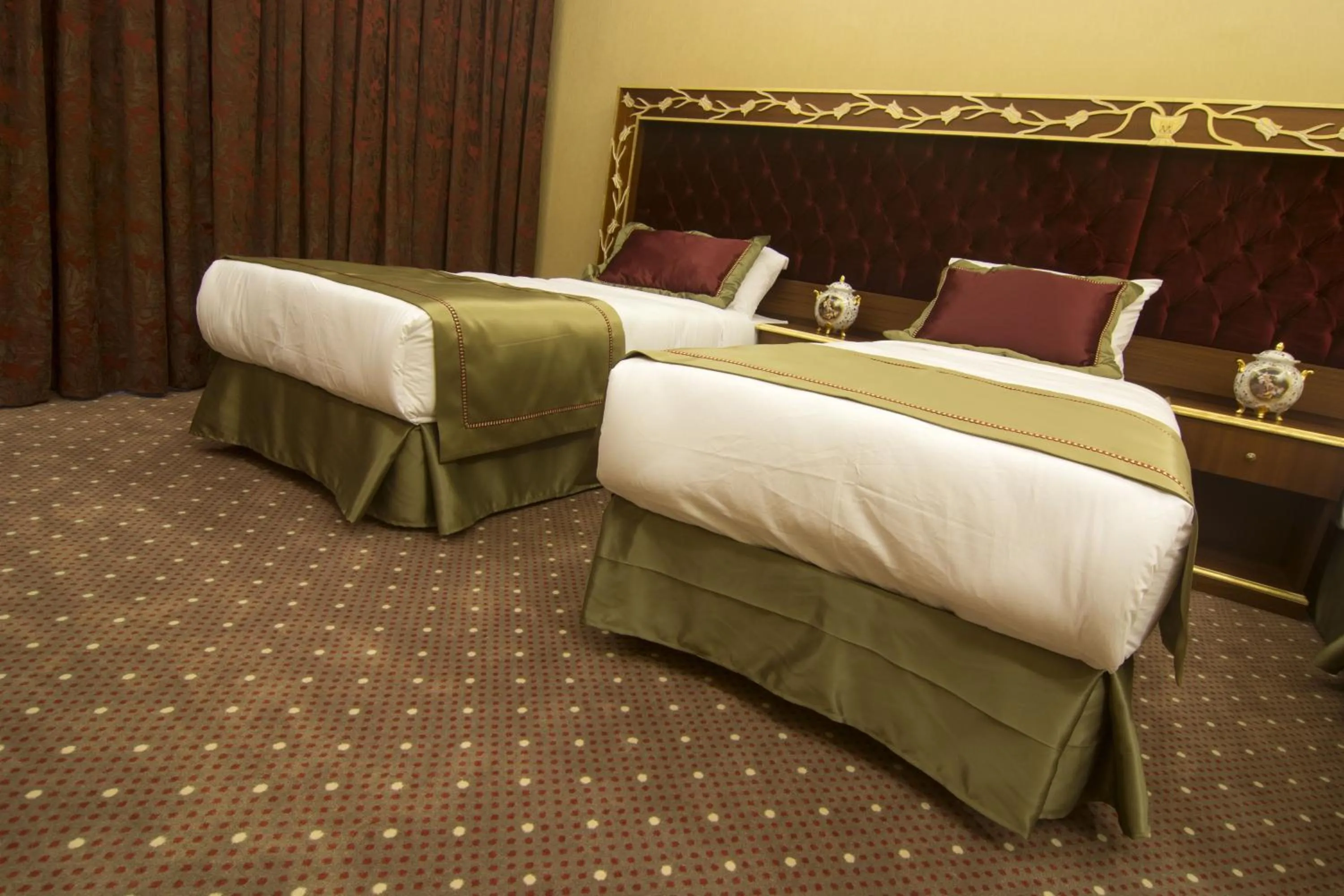 Bedroom in MB Deluxe Hotel