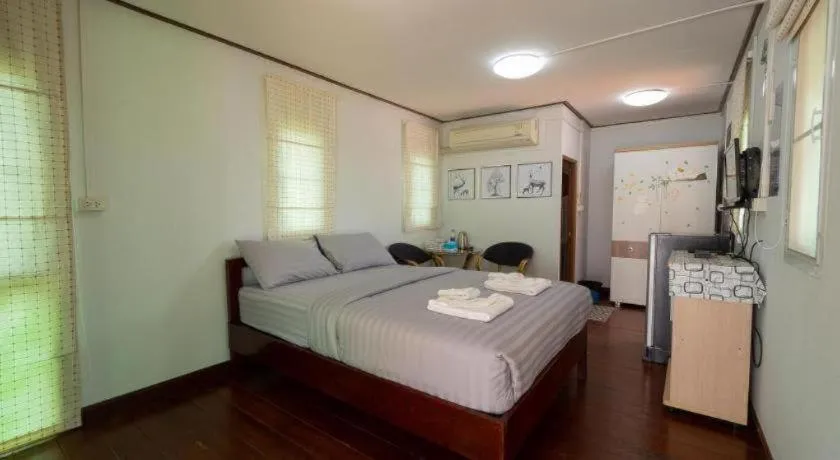 Bed in Baan Tem Jai Khao Yai