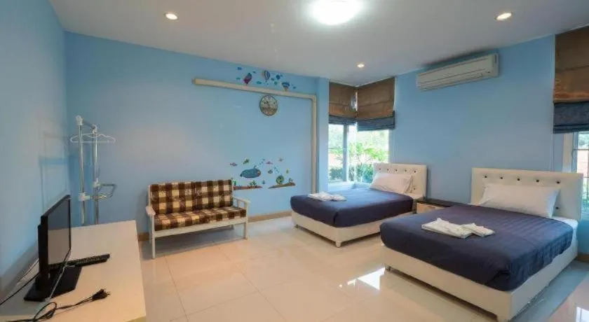 Bed in Baan Tem Jai Khao Yai