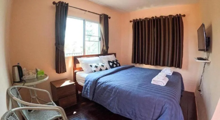 Bed in Baan Tem Jai Khao Yai