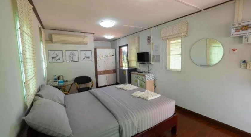 Bed in Baan Tem Jai Khao Yai