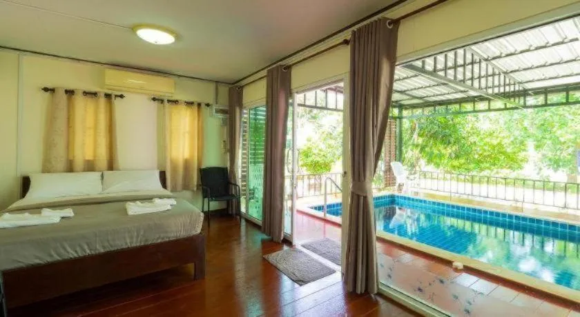 Bed in Baan Tem Jai Khao Yai