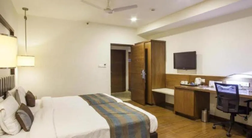 Bed in Hotel Minerva Grand