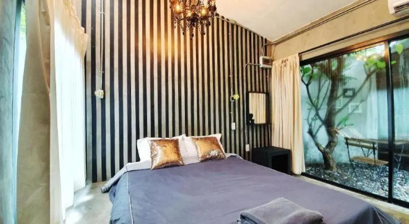 Bed in PAUSE Resort & Bar