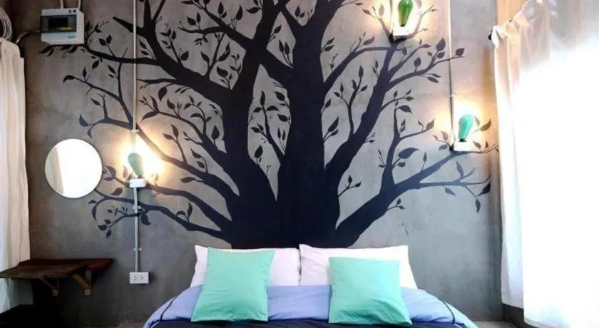 Bed in PAUSE Resort & Bar