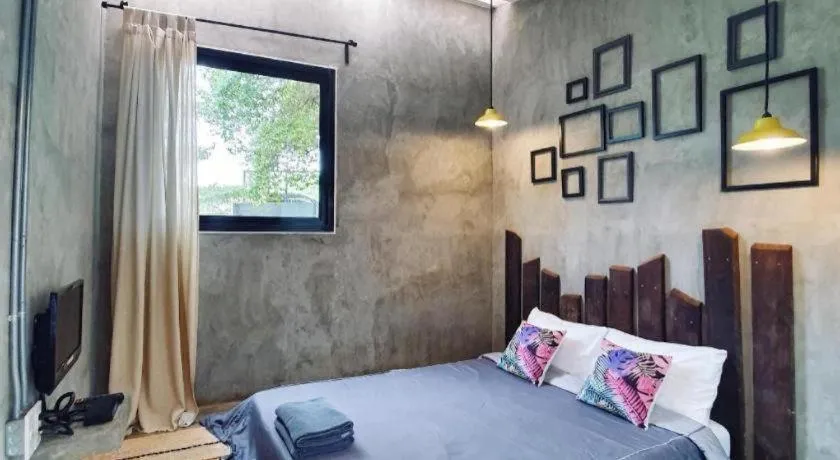 Bed in PAUSE Resort & Bar