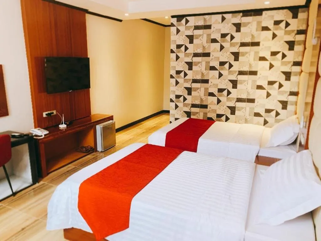 Bed in STARVIEW HOTEL AND RESORT