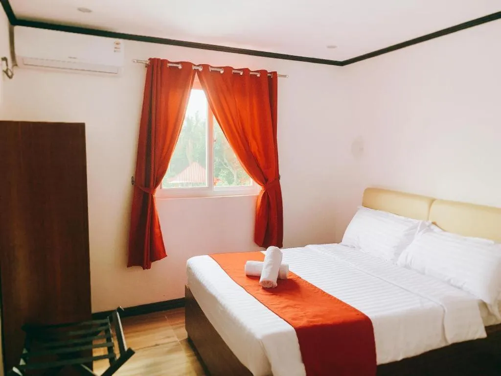 Bed in STARVIEW HOTEL AND RESORT