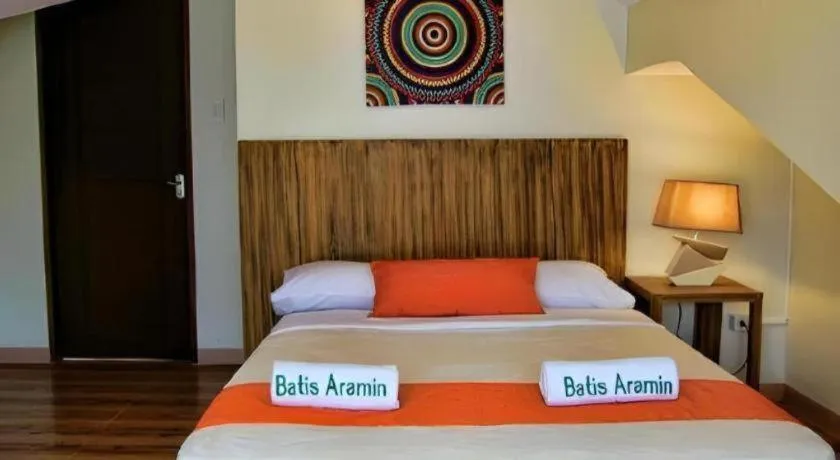 Bed in Batis Aramin Resort And Hotel Corp.