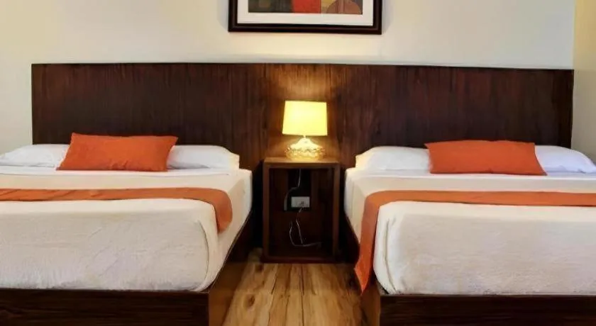 Bed in Batis Aramin Resort And Hotel Corp.