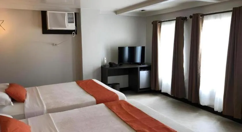 Bed in Batis Aramin Resort And Hotel Corp.