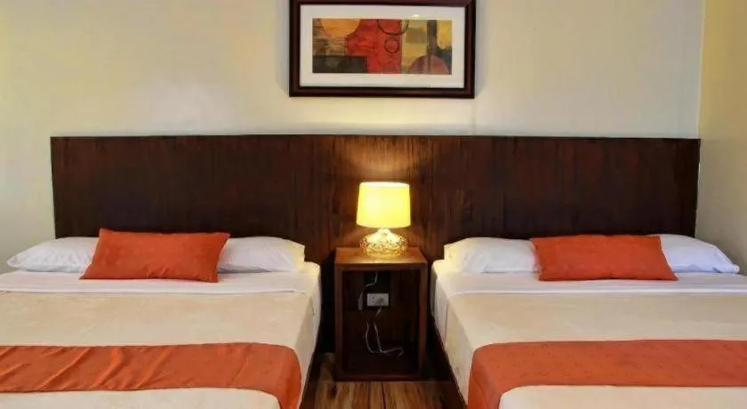 Bed in Batis Aramin Resort And Hotel Corp.